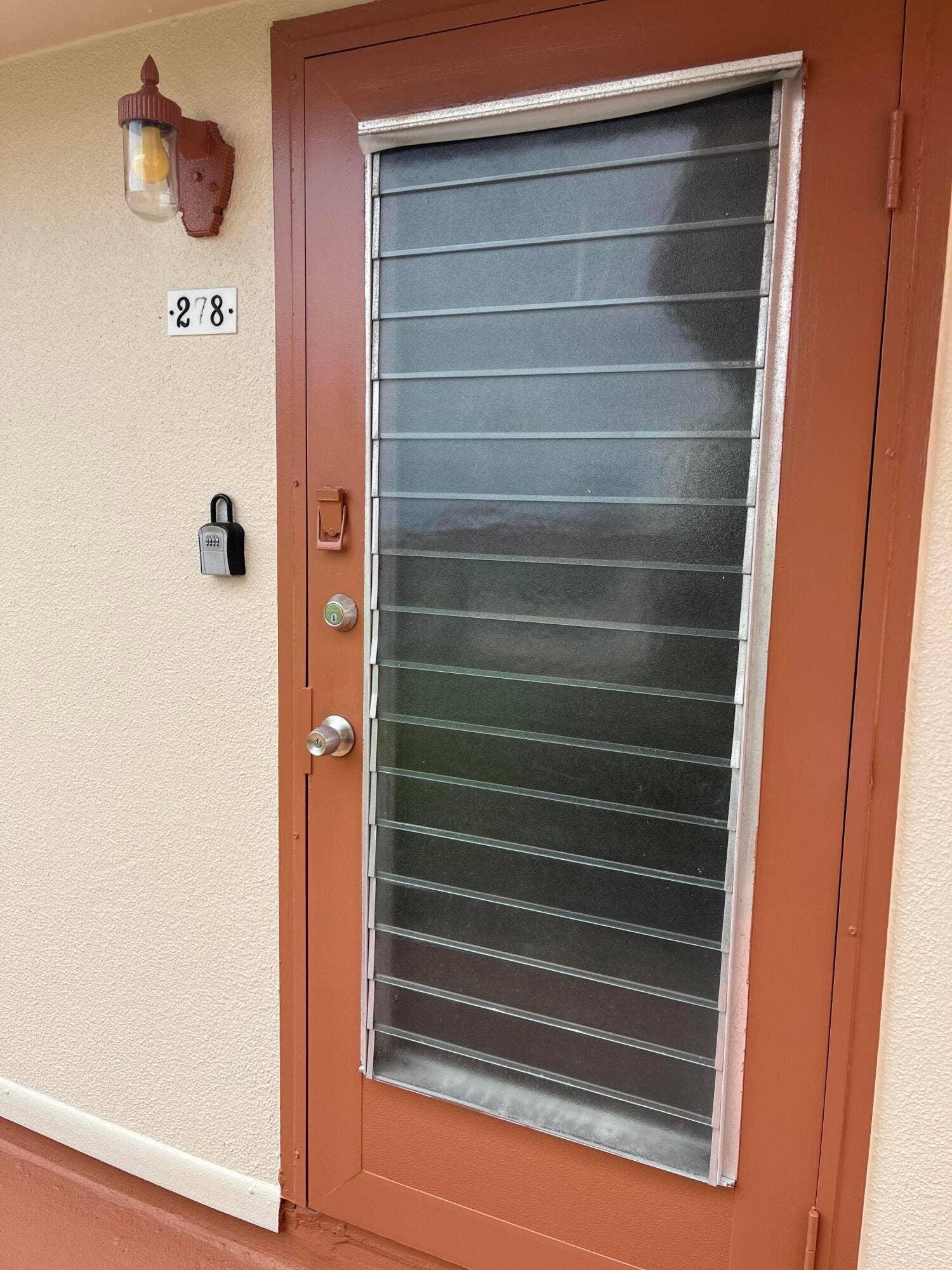 278 SEVILLE L, Delray Beach, FL 33446 louver jalousie front door