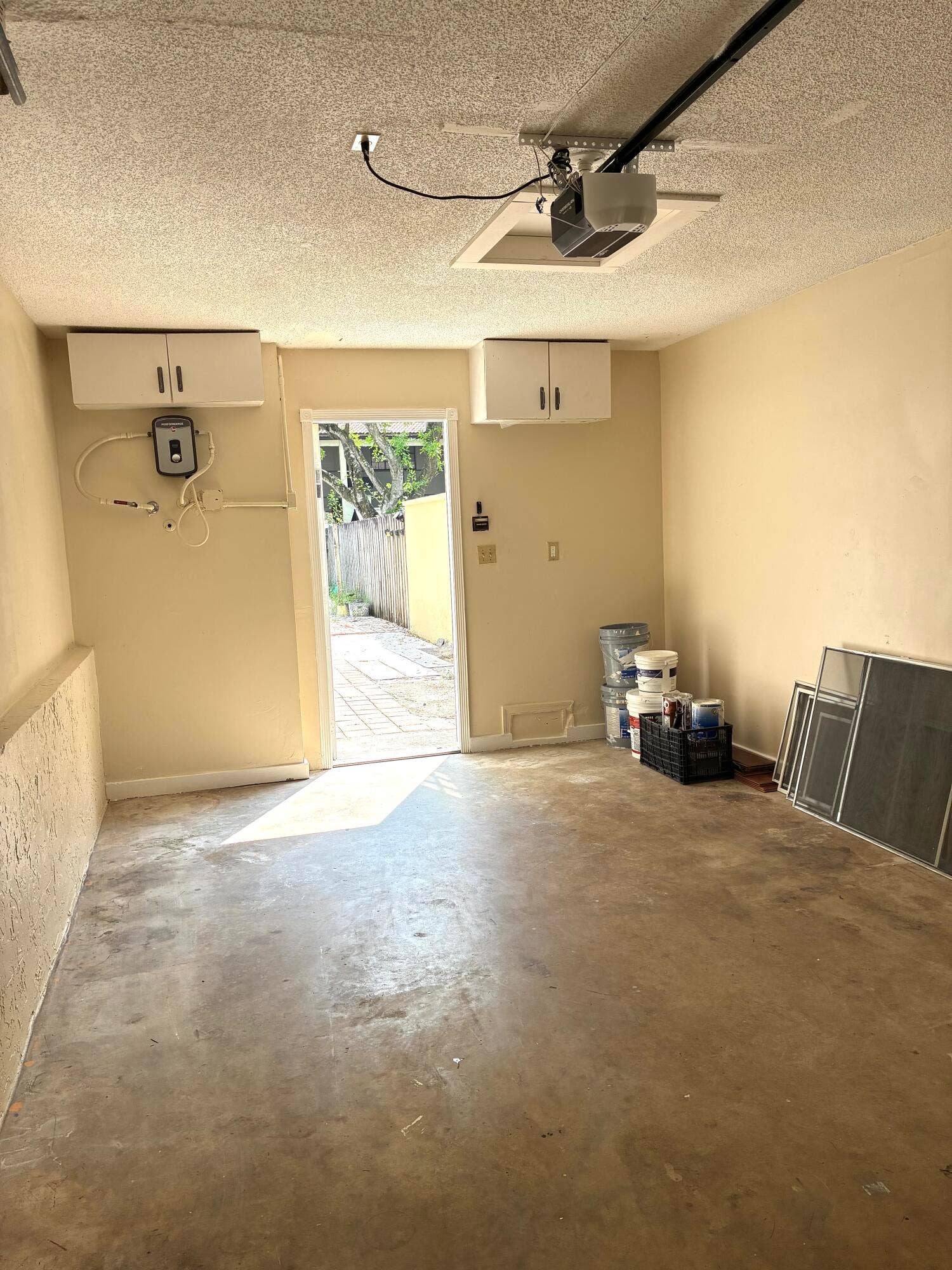 11560 NW 23RD Street NW, #E, Coral Springs, FL 33065 garage entrance door from garden