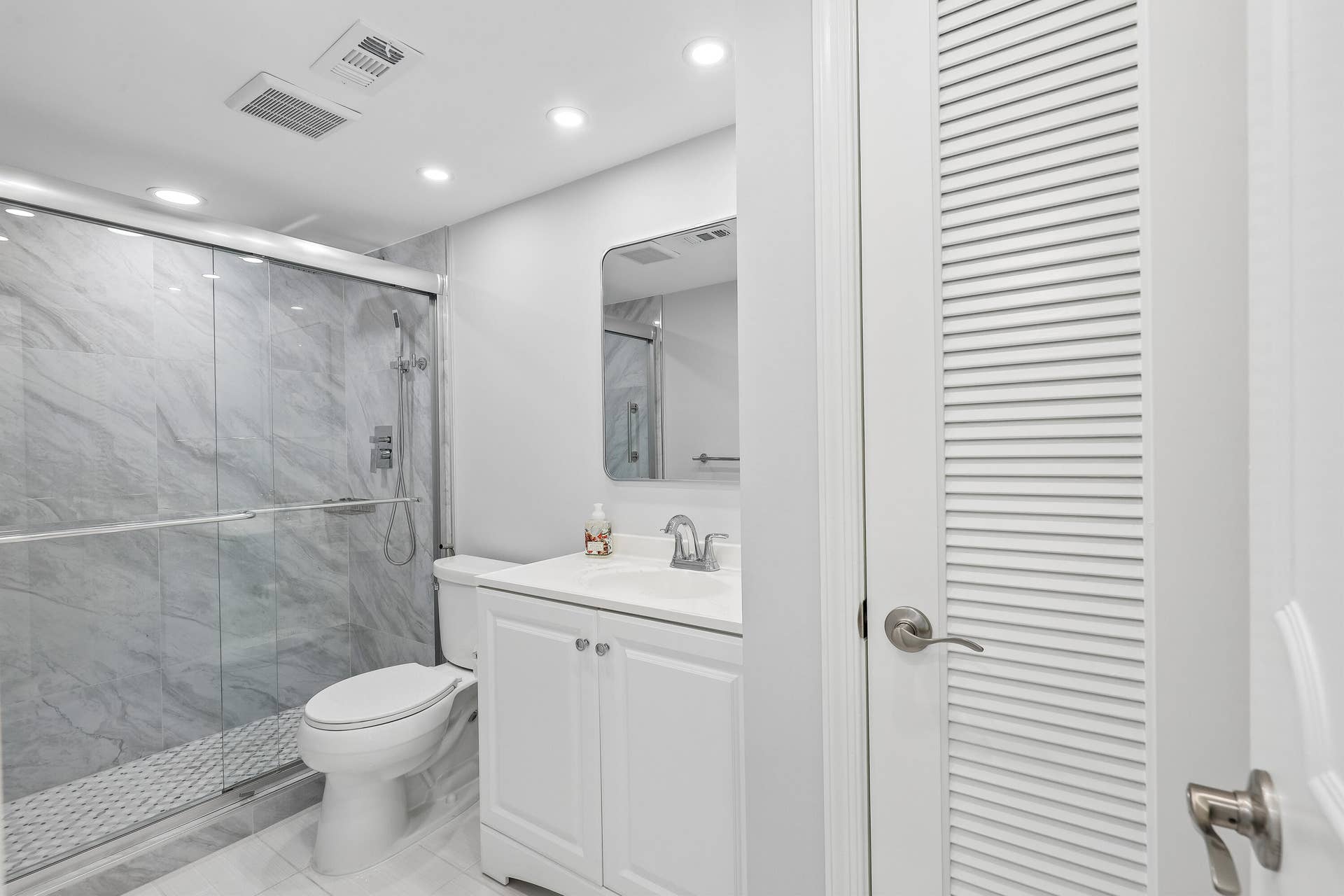 711 N Birch Road, #204, Fort Lauderdale, FL 33304 Linen closet in bathroom