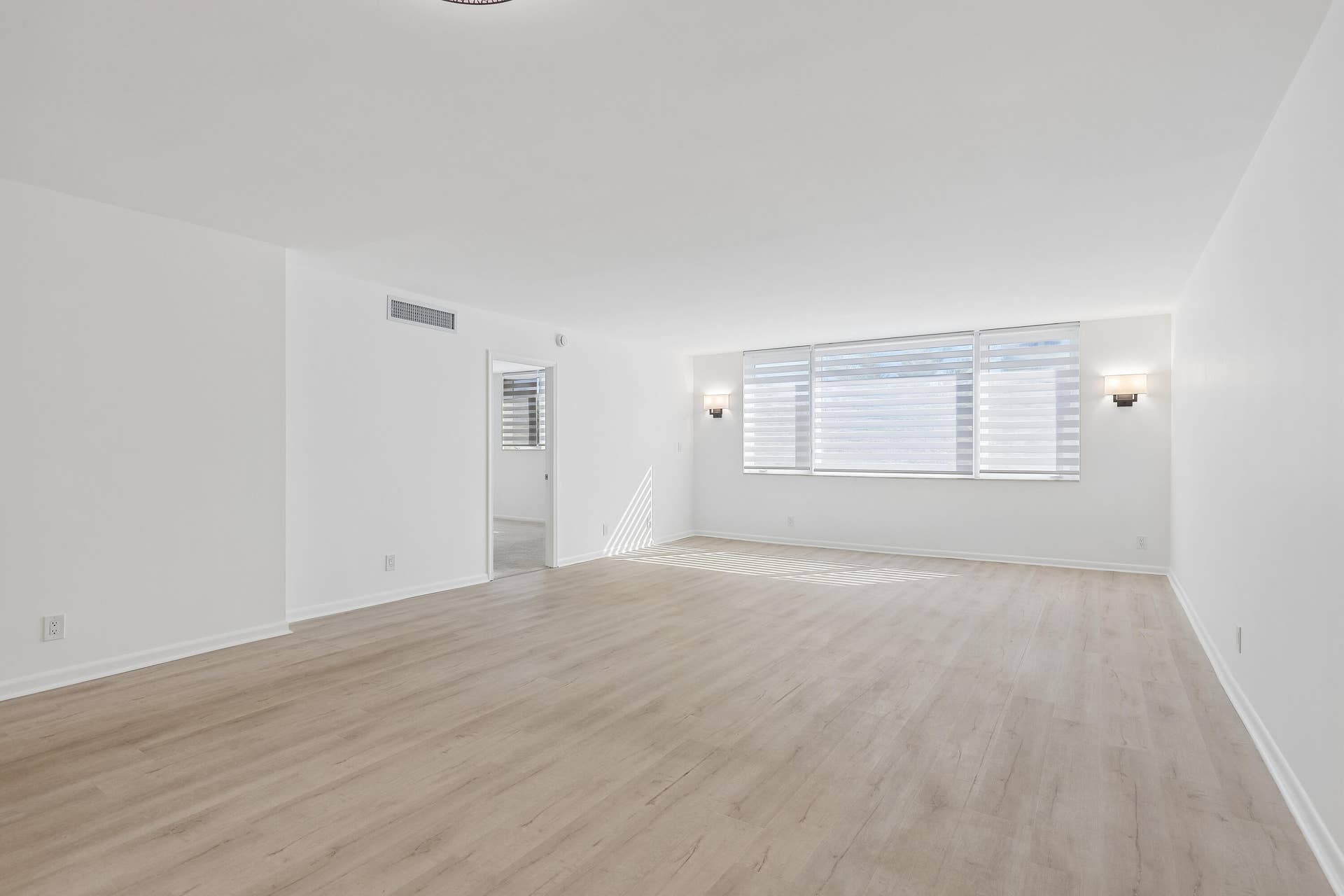 711 N Birch Road, #204, Fort Lauderdale, FL 33304 Luxury Vinyl flooring throughout the living/dining area.