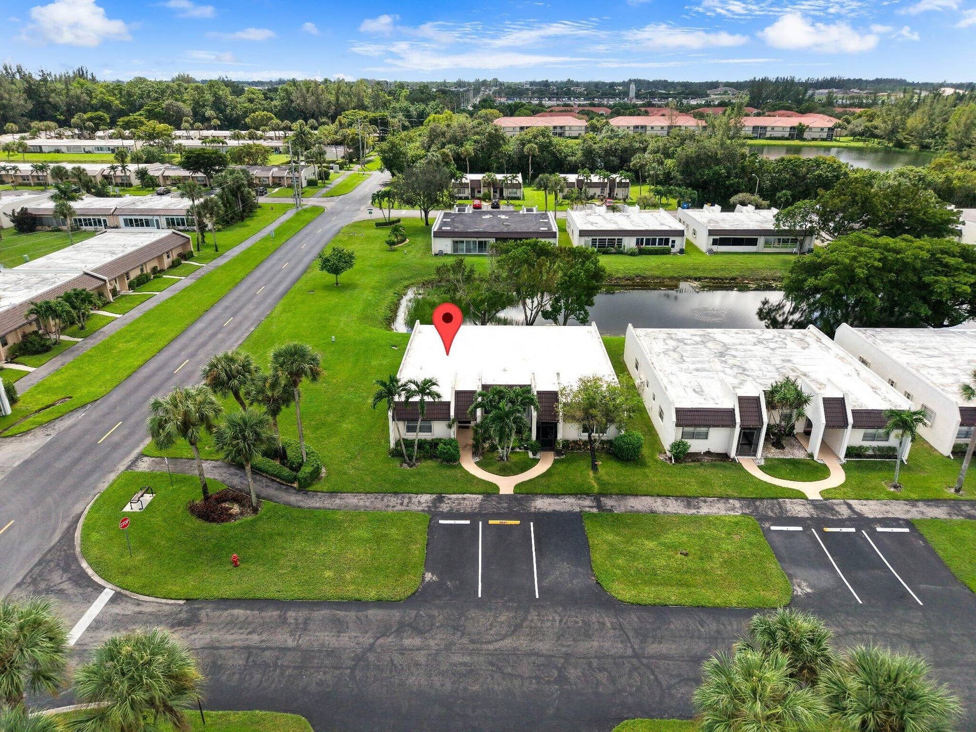 100 Lake Rebecca Drive, West Palm Beach, FL 33411 Corner Unit Complete Accordian Shutters