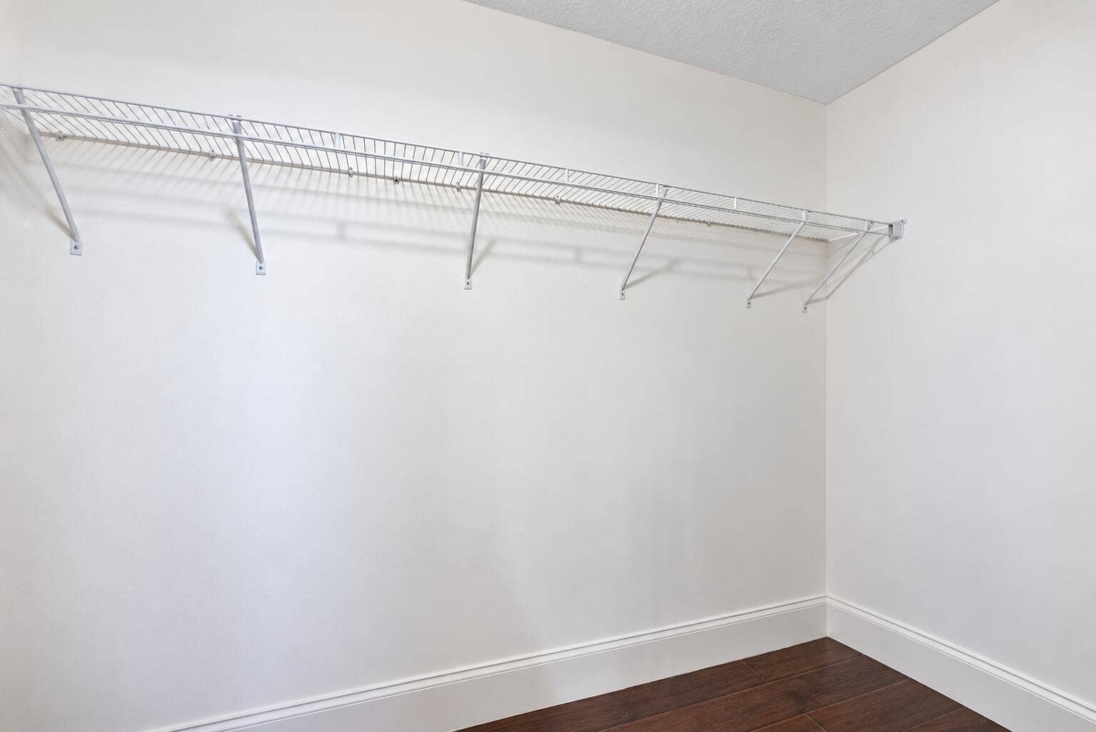 Primary bedroom walk in Closet