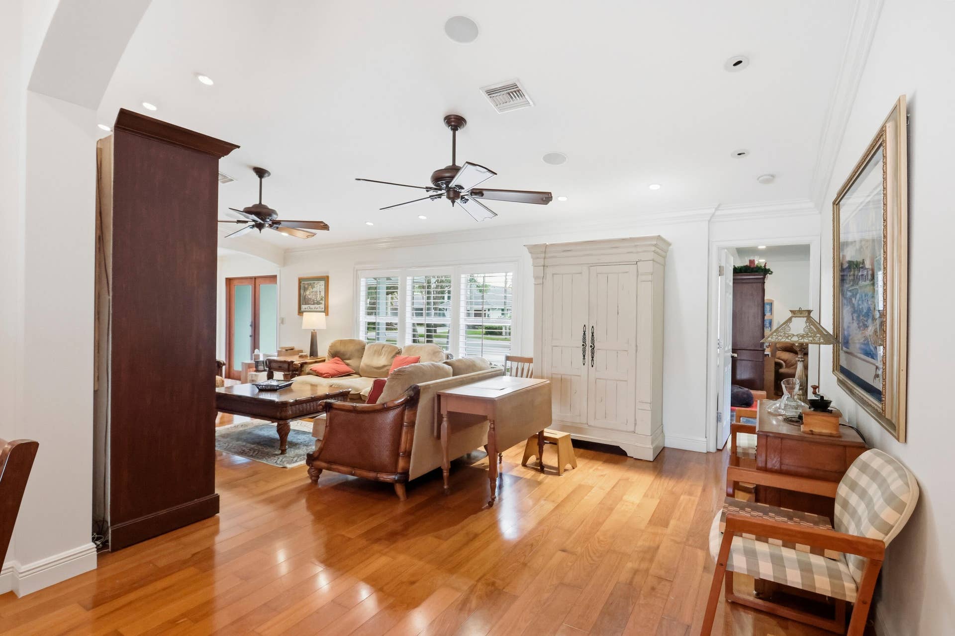 2919 Banyan Blvd Circle NW, Boca Raton, FL 33431 Hardwood flooring, recessed lighting, crown molding, ceiling fans, and multi-pane windows