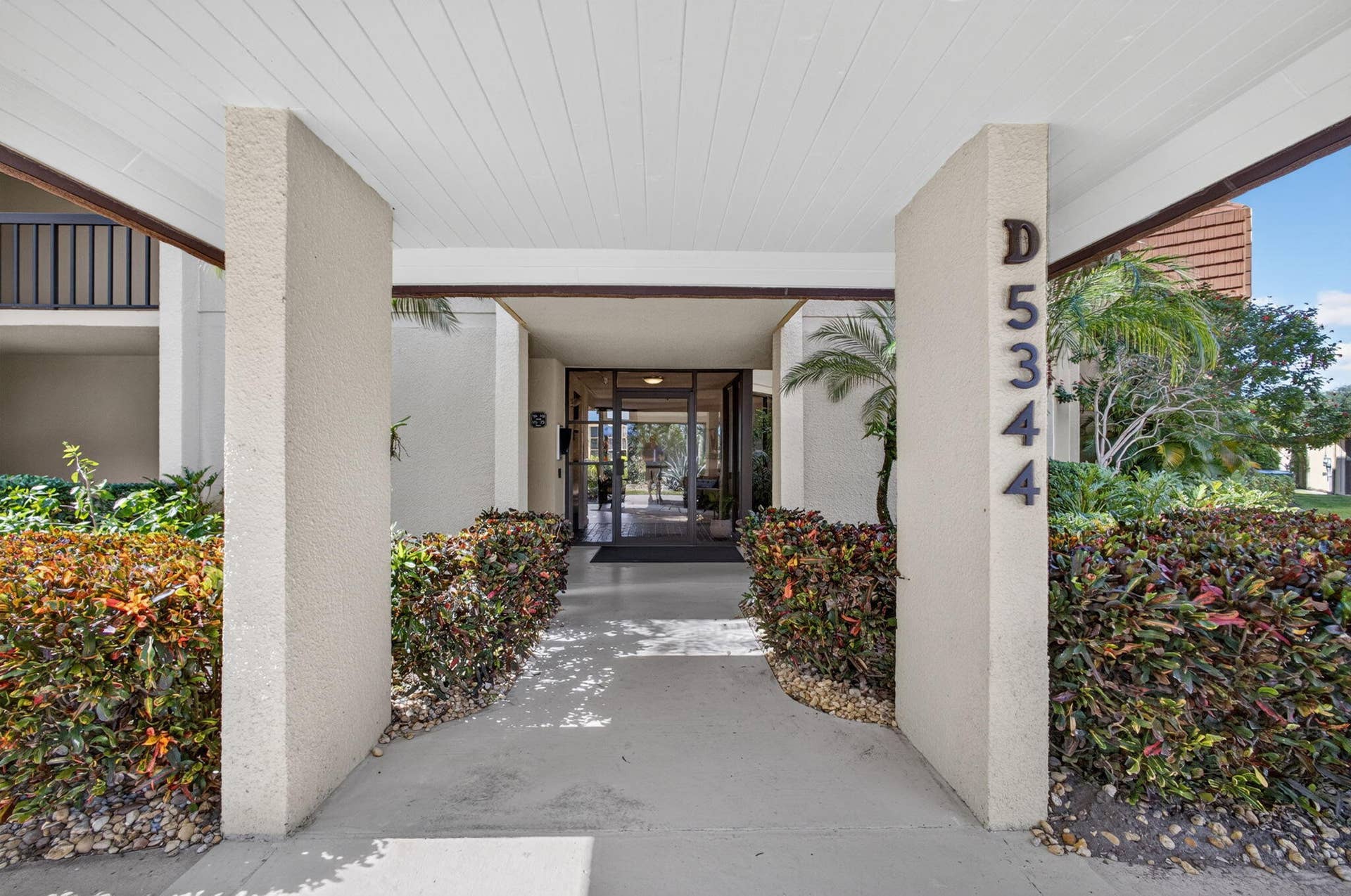 5344 WOODLAND LAKES Drive, #225, Palm Beach Gardens, FL 33418 Exterior Front Entrance