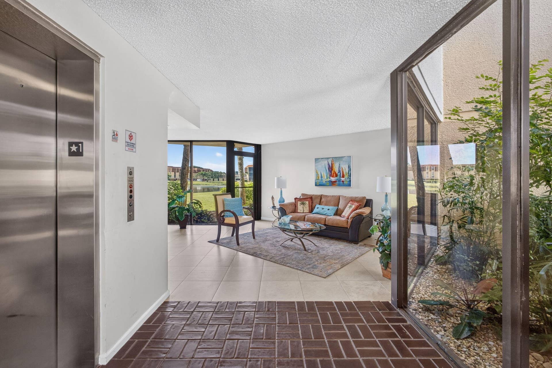 5344 WOODLAND LAKES Drive, #225, Palm Beach Gardens, FL 33418 Lobby