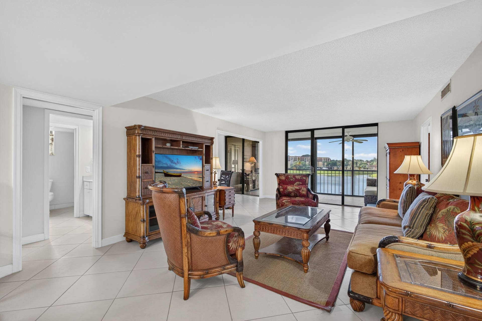5344 WOODLAND LAKES Drive, #225, Palm Beach Gardens, FL 33418 17-web-or-mls-WL - Living Rm 1