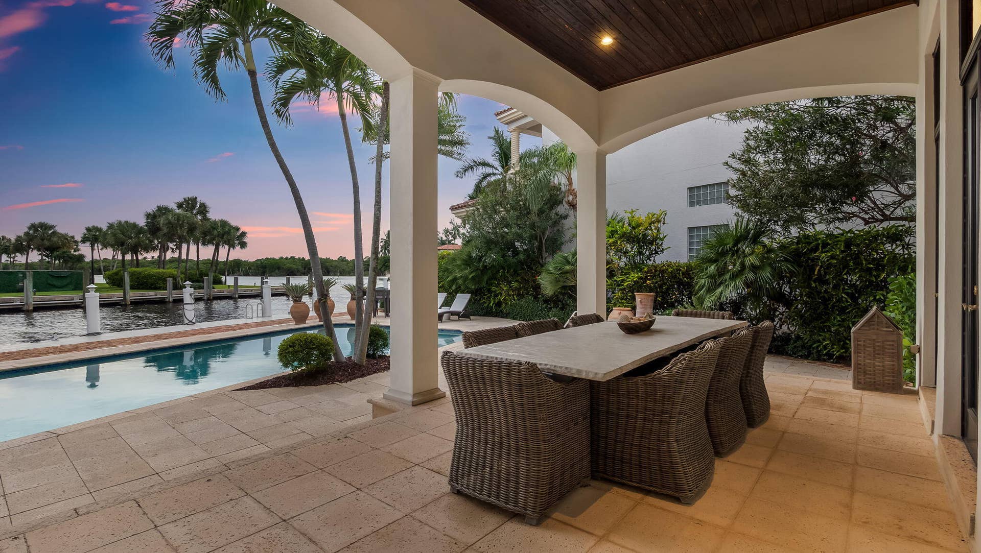 1014 Grand Court, Highland Beach, FL 33487 Outdoor Dining Area at Dusk