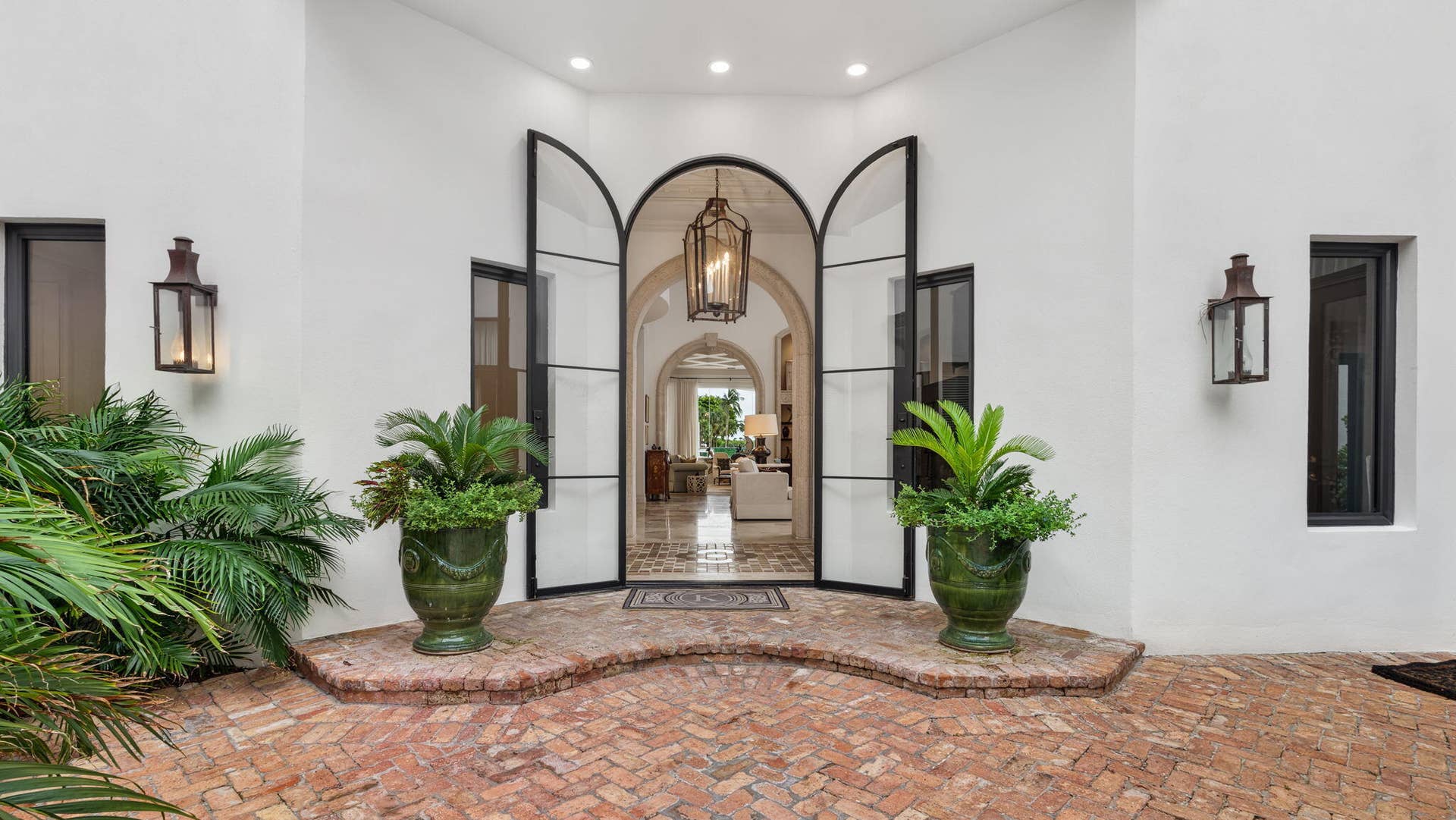 1014 Grand Court, Highland Beach, FL 33487 Front Entrance in interior courtyard