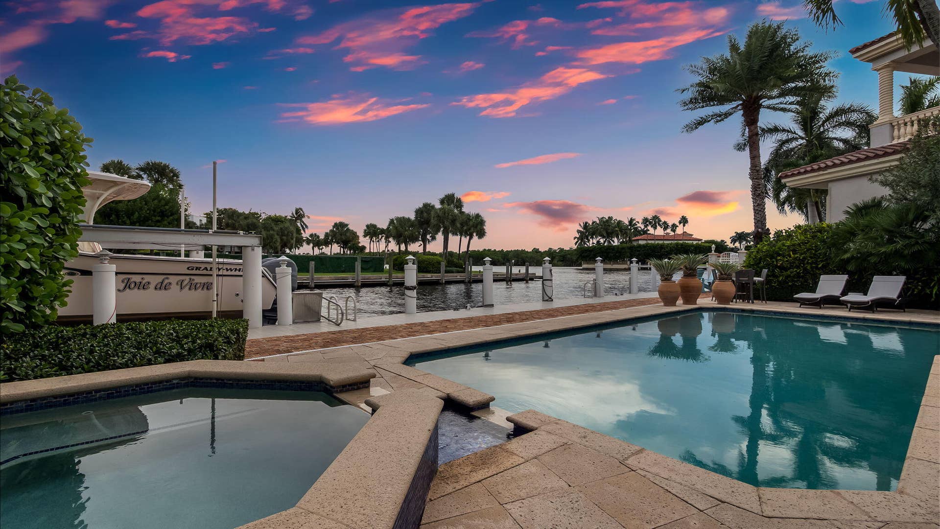 1014 Grand Court, Highland Beach, FL 33487 Intracoastal and pool view at dusk