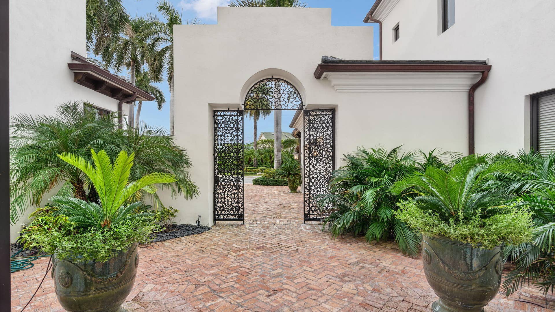 1014 Grand Court, Highland Beach, FL 33487 Gated front entrance