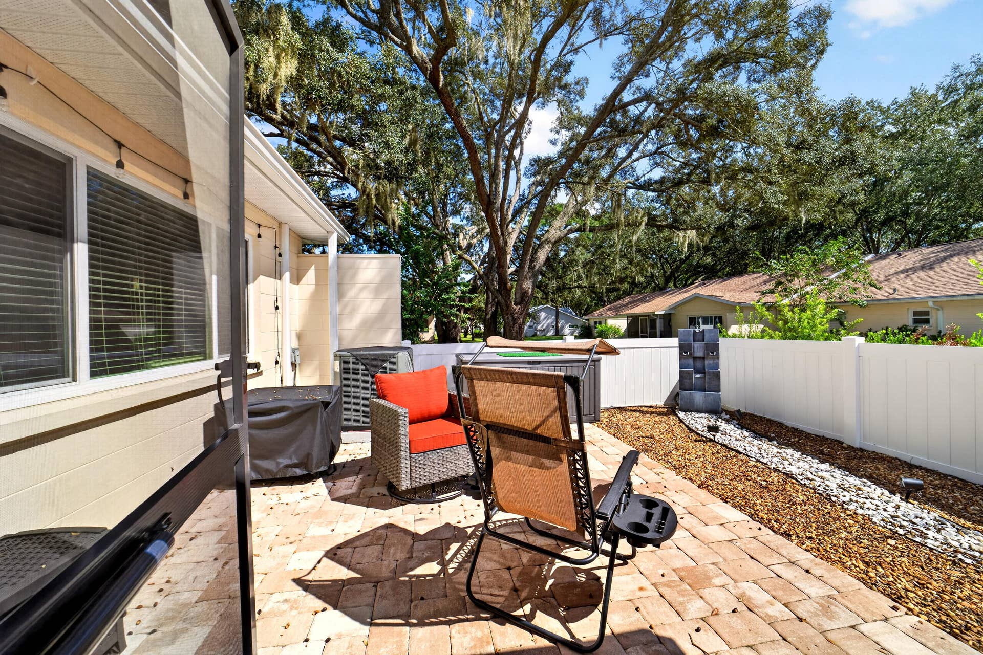 9675 SW 85th Avenue, #B, Ocala, FL 34481 Patio with Pavers and Rocks out Back