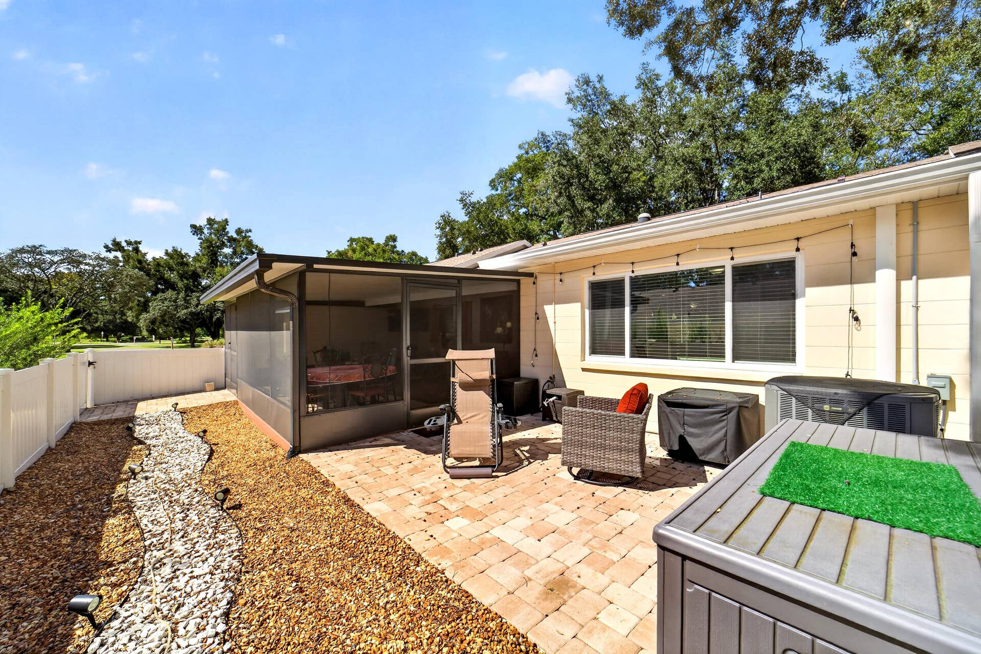 9675 SW 85th Avenue, #B, Ocala, FL 34481 Patio with Pavers and Rocks out Back