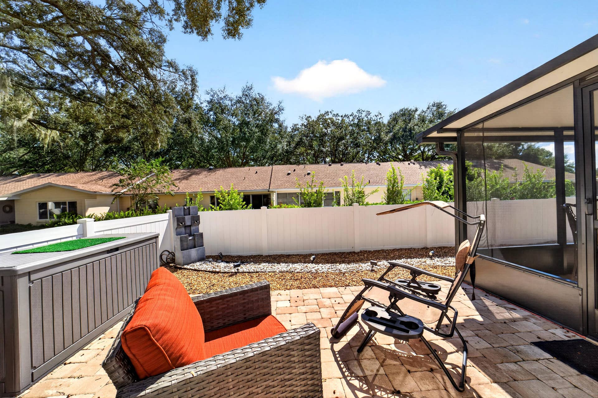 9675 SW 85th Avenue, #B, Ocala, FL 34481 Patio with Pavers and Rocks out Back