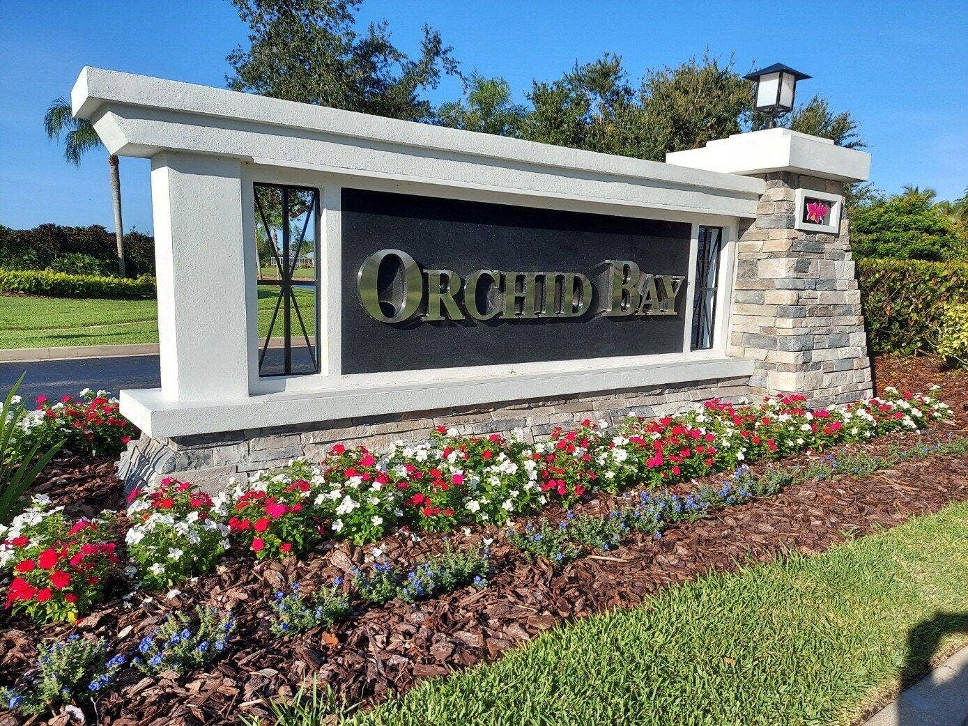 5530 SW Orchid Bay Drive, Palm City, FL 34990 community entrance