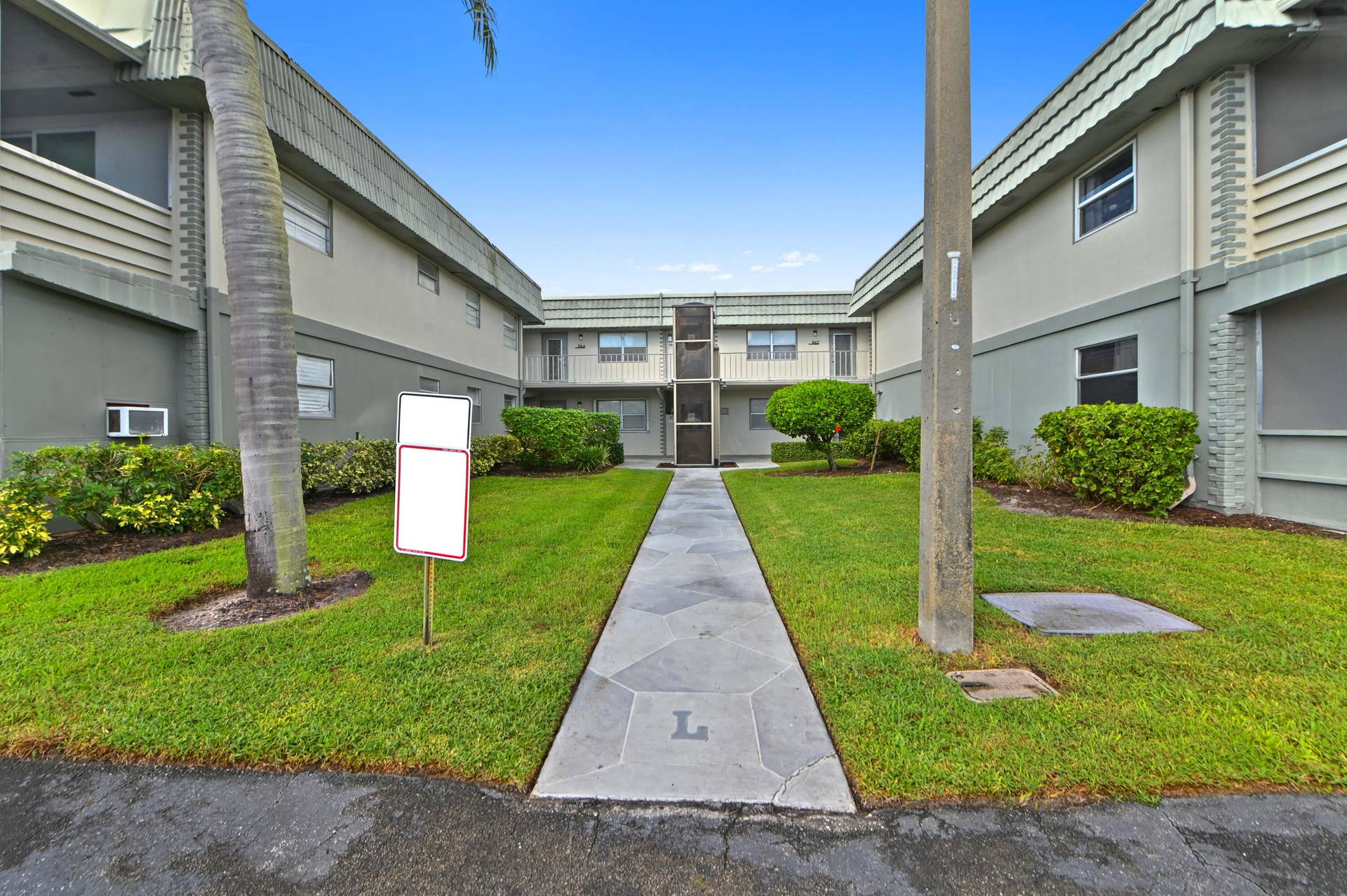 562 Monaco L, Delray Beach, FL 33446 14 - 02 Front 02