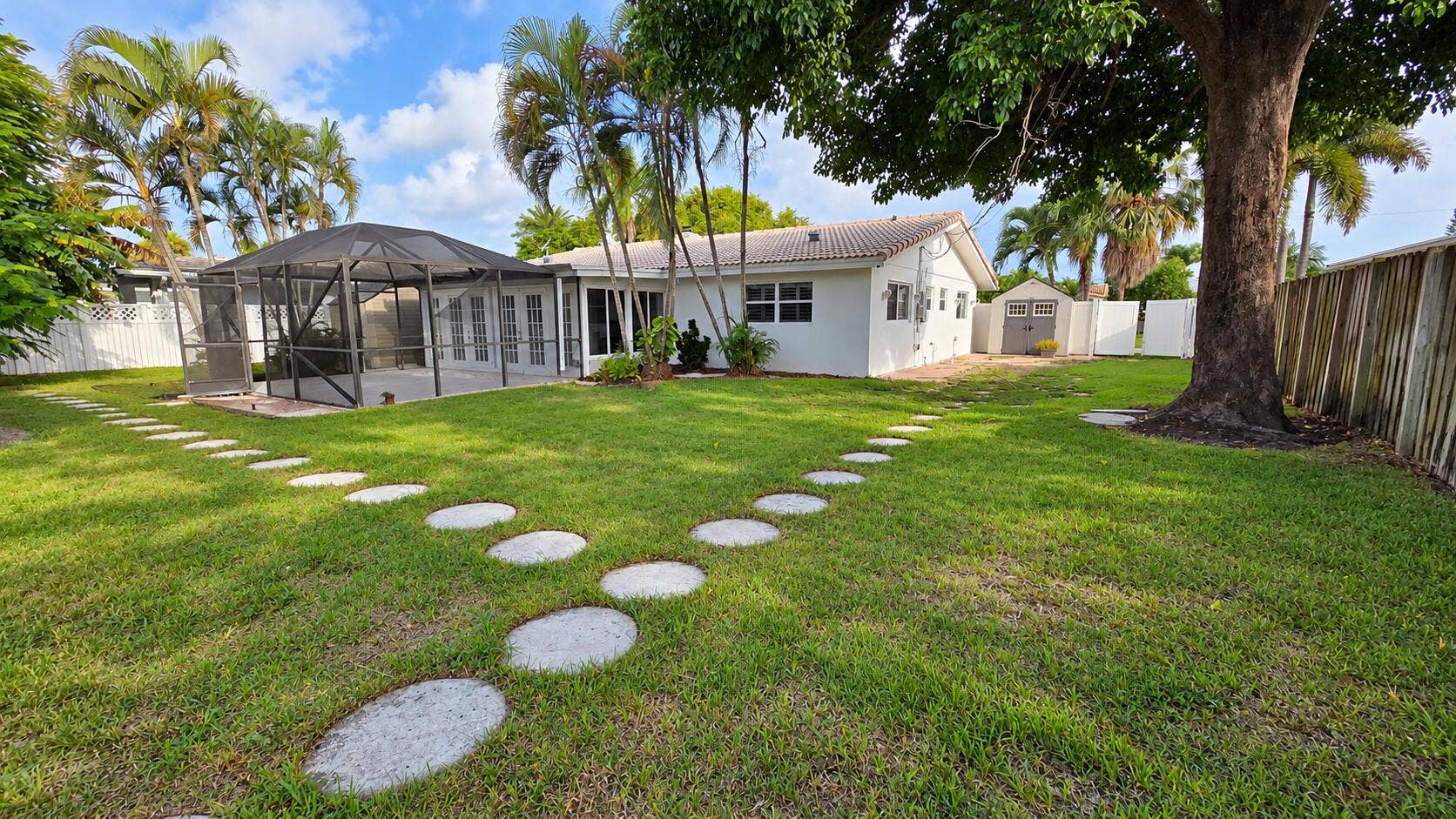 Tropical Backyard with Screened Lanai