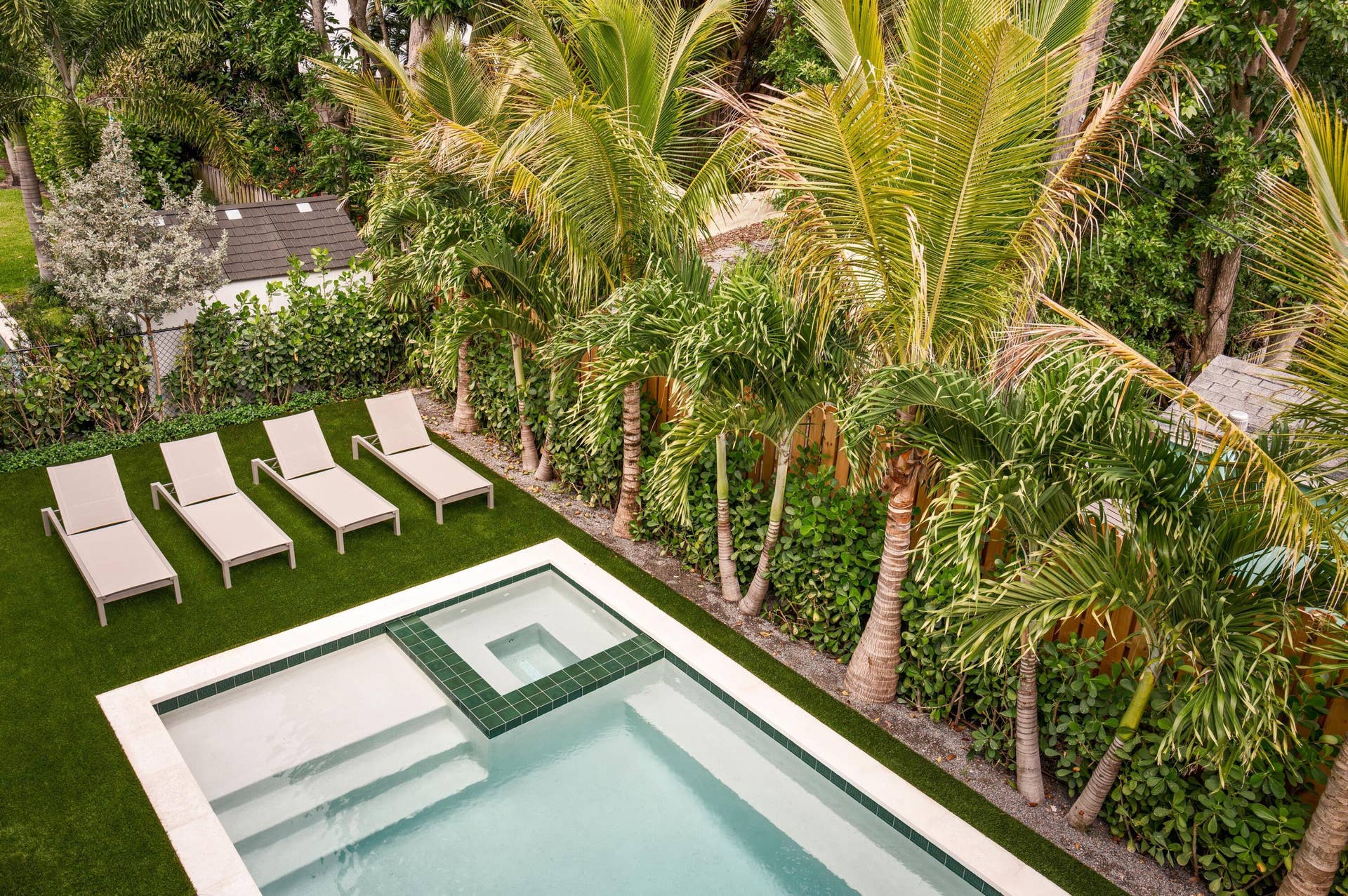 309 Greymon Drive, West Palm Beach, FL 33405 07 - Backyard pool with green tile accen