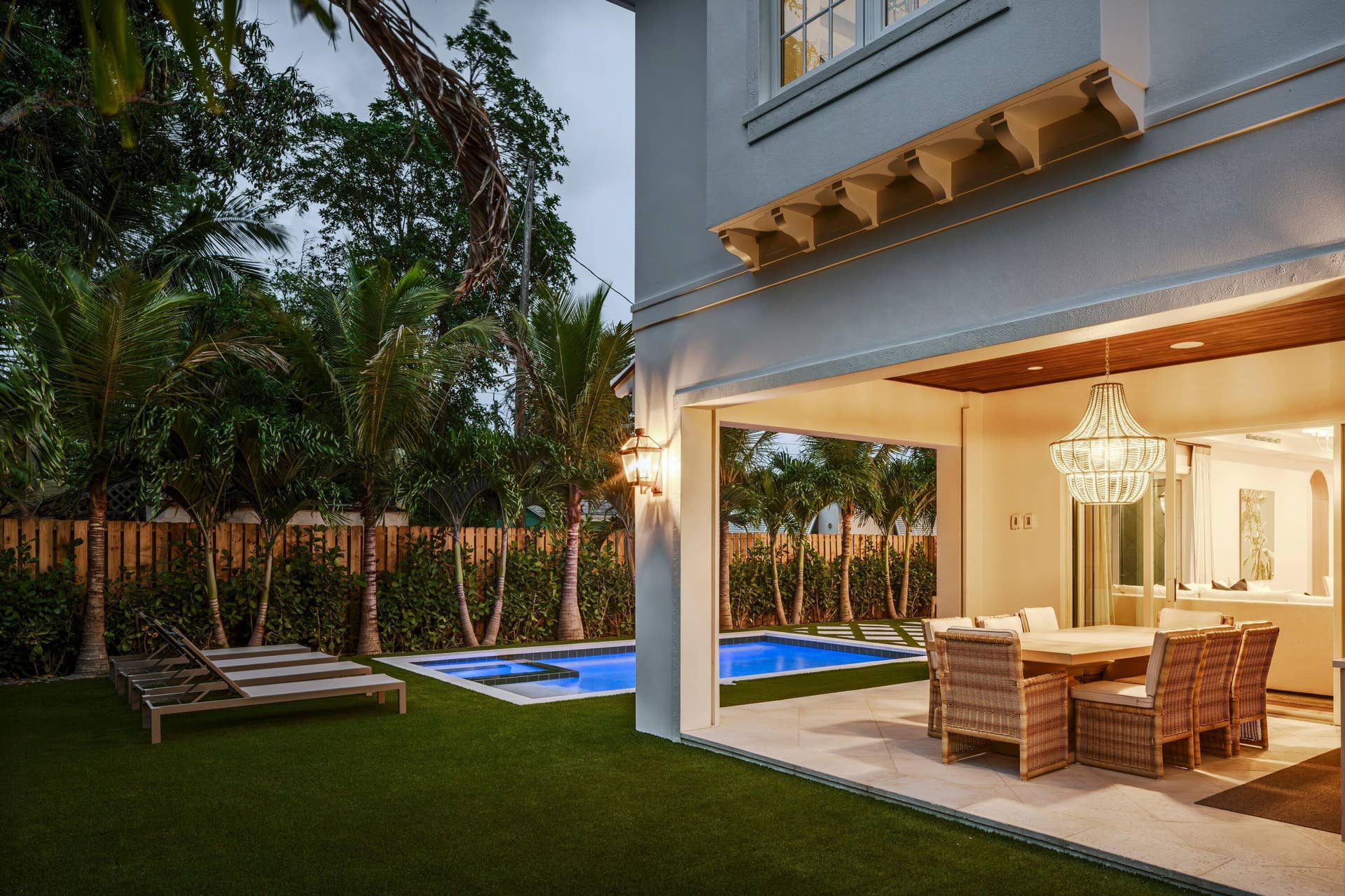 309 Greymon Drive, West Palm Beach, FL 33405 10 - Covered patio with wicker dining se