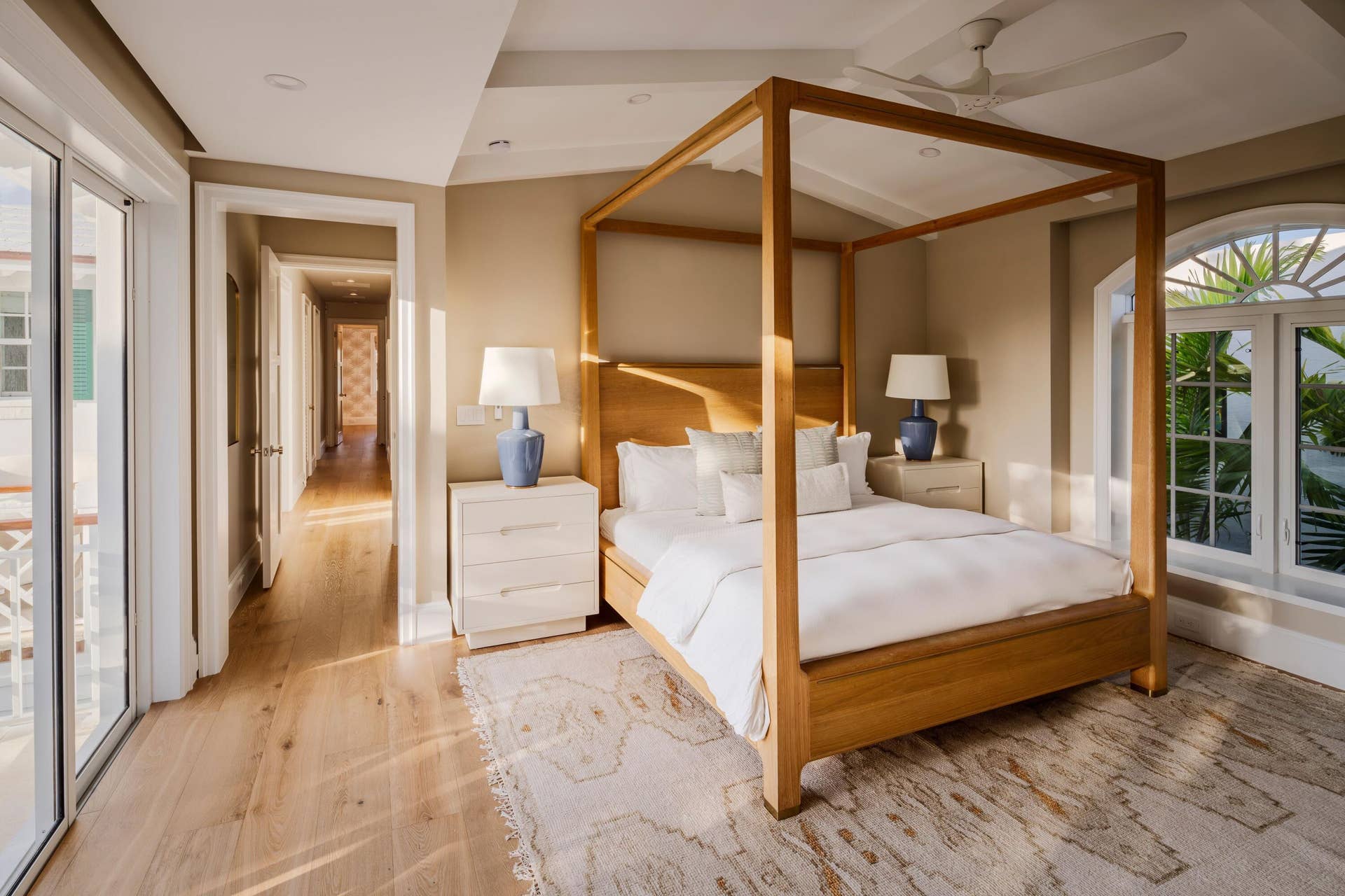 309 Greymon Drive, West Palm Beach, FL 33405 30 - Master bedroom with canopy bed, lig