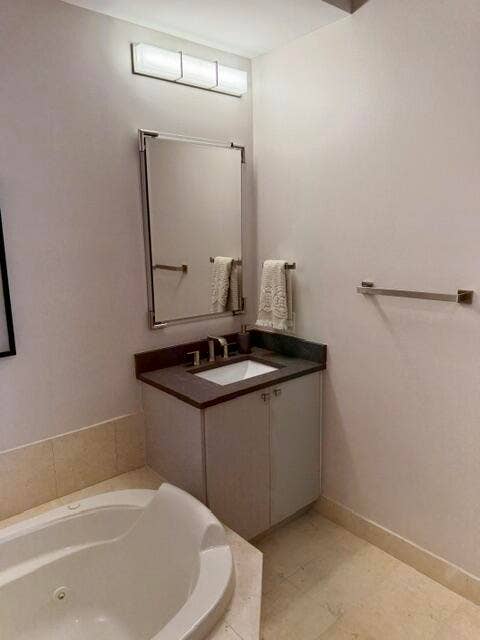 Primary Bath with Separate Sinks and Soaking Tub.