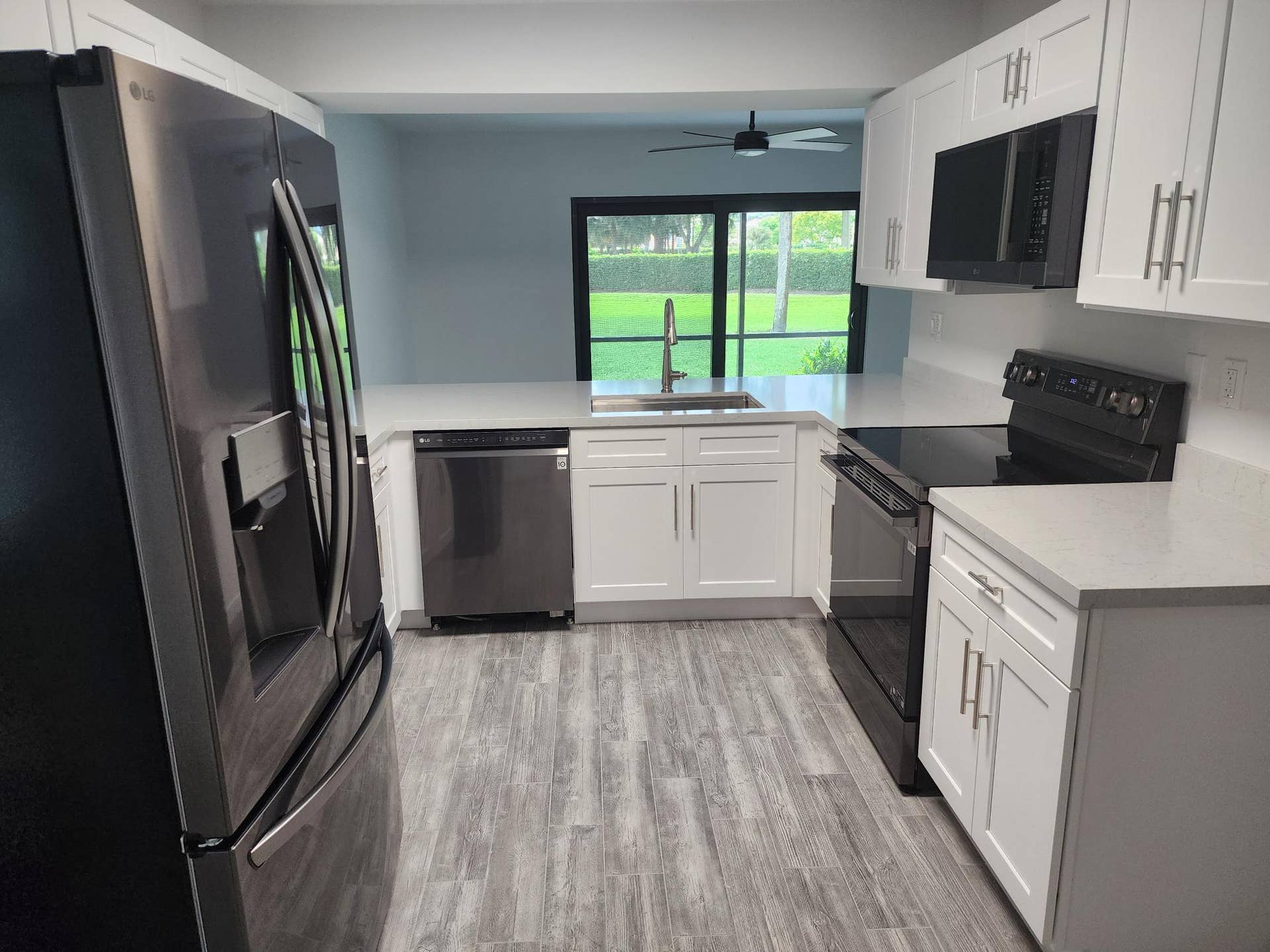 9885 Riverside Drive, Coral Springs, FL 33071 kitchen with pass through view