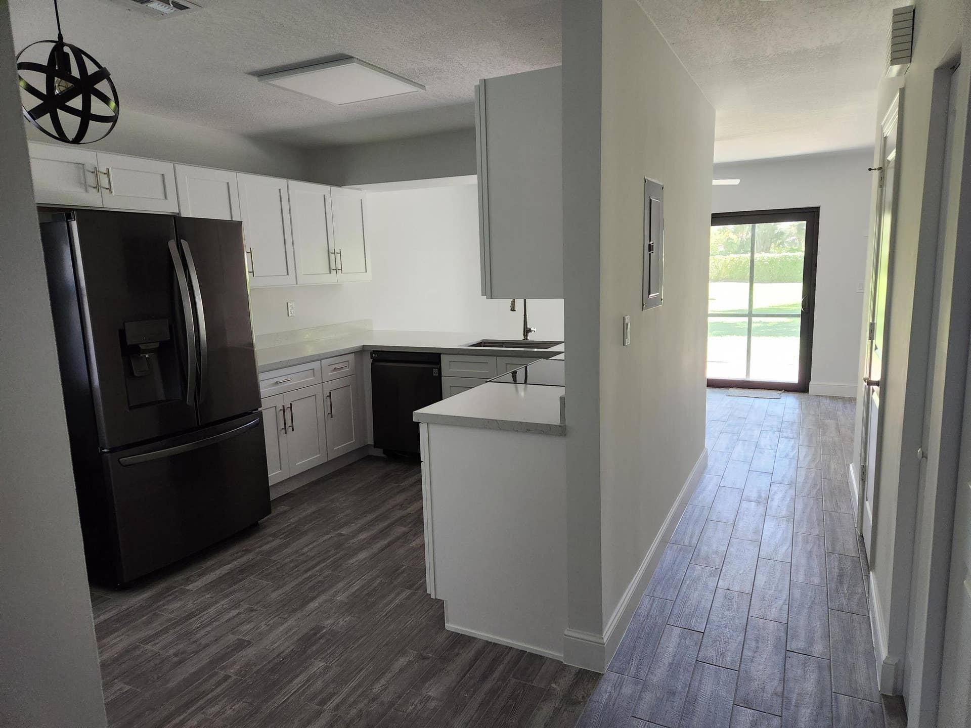 9885 Riverside Drive, Coral Springs, FL 33071 kitchen from hallway view
