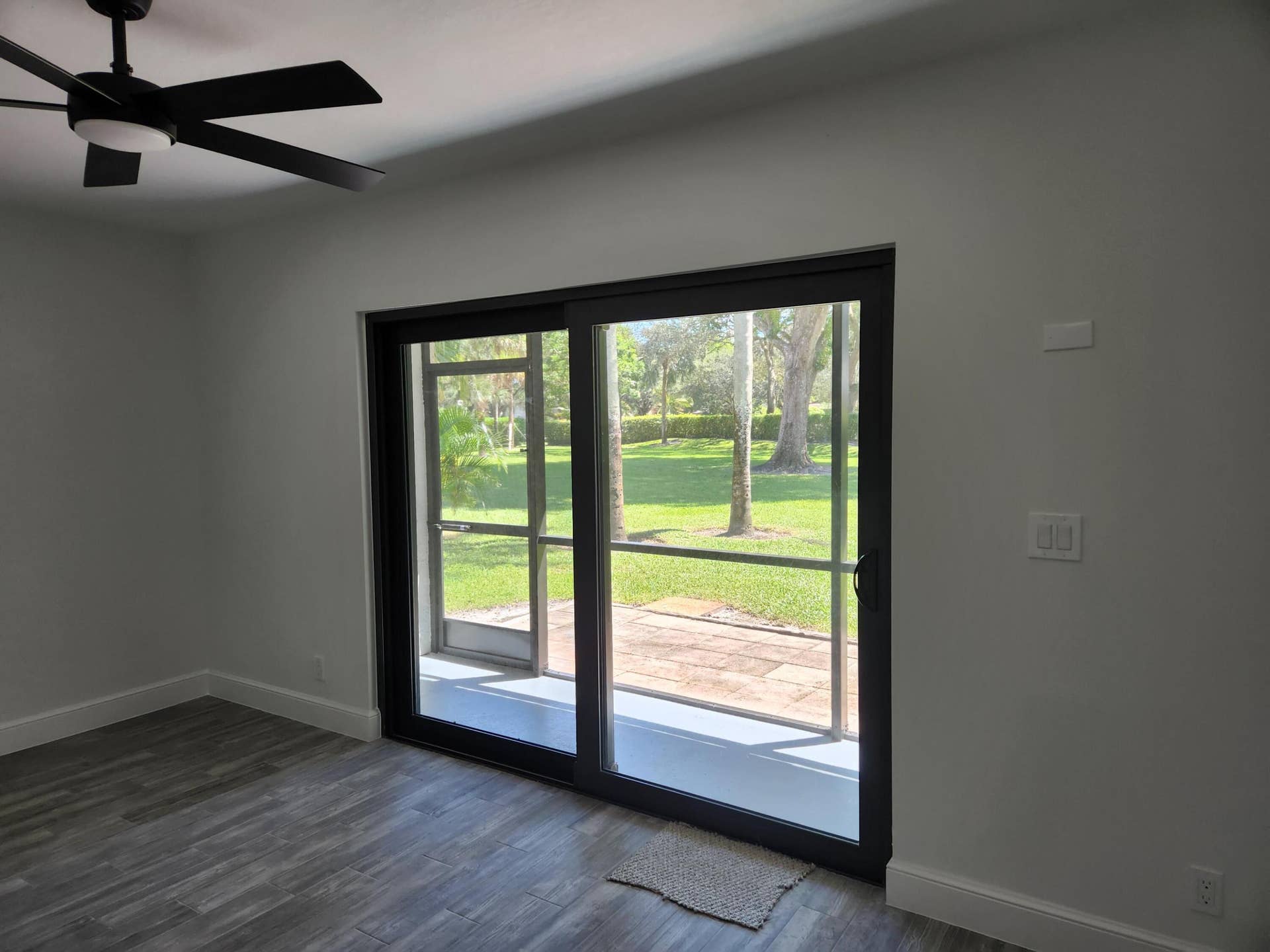 9885 Riverside Drive, Coral Springs, FL 33071 back room sliding impact door to porch