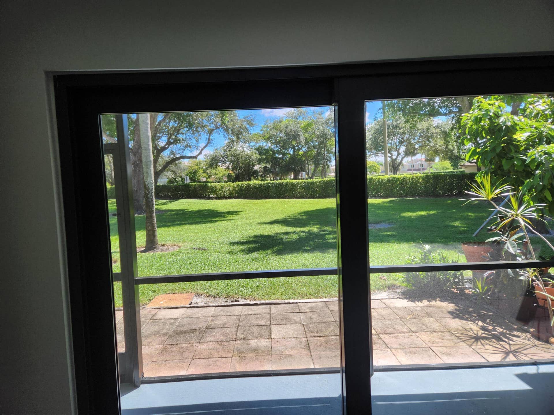 9885 Riverside Drive, Coral Springs, FL 33071 garden view from back room.