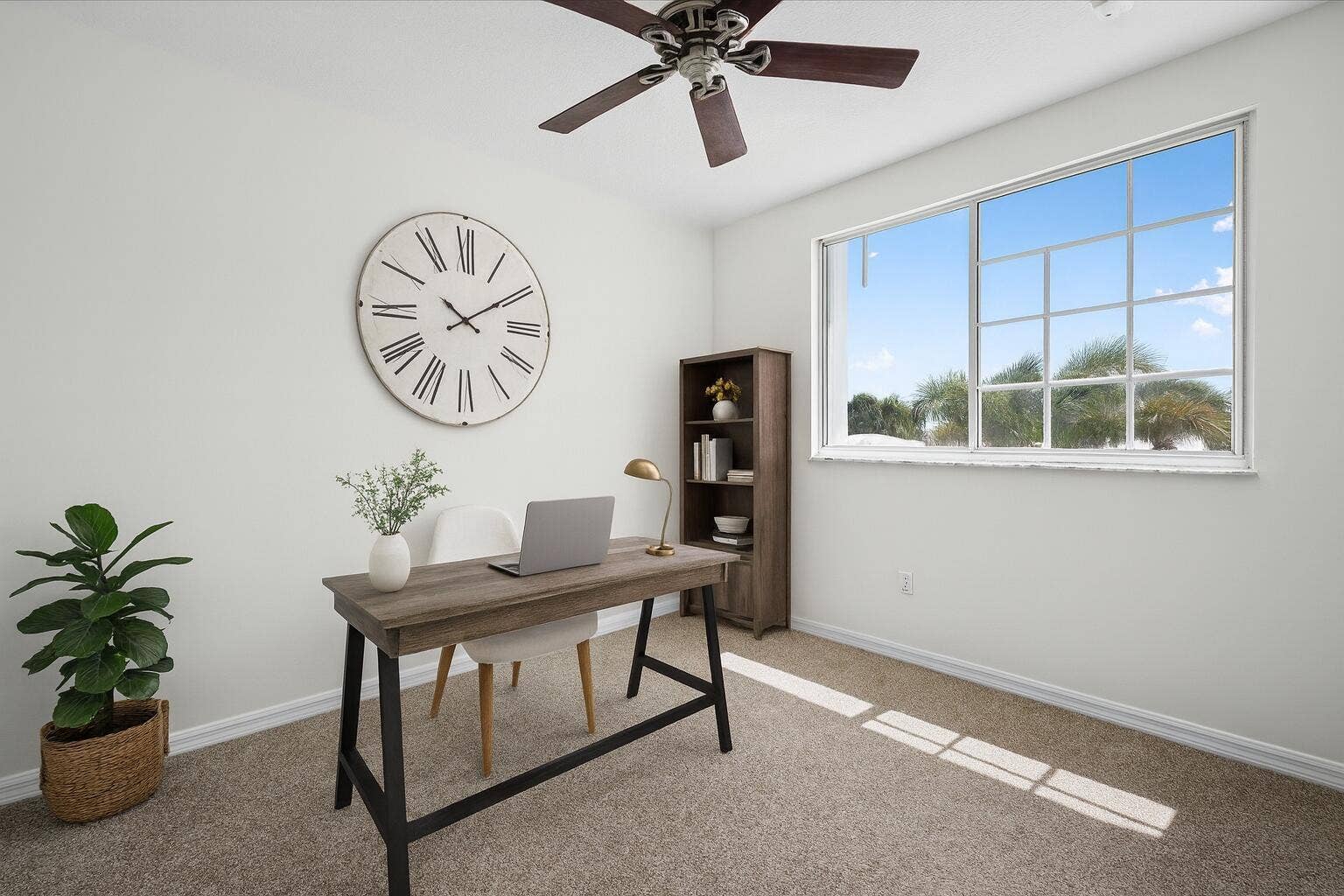 Virtually staged bedroom showcasing its potential as a comfortable home office or flex space.