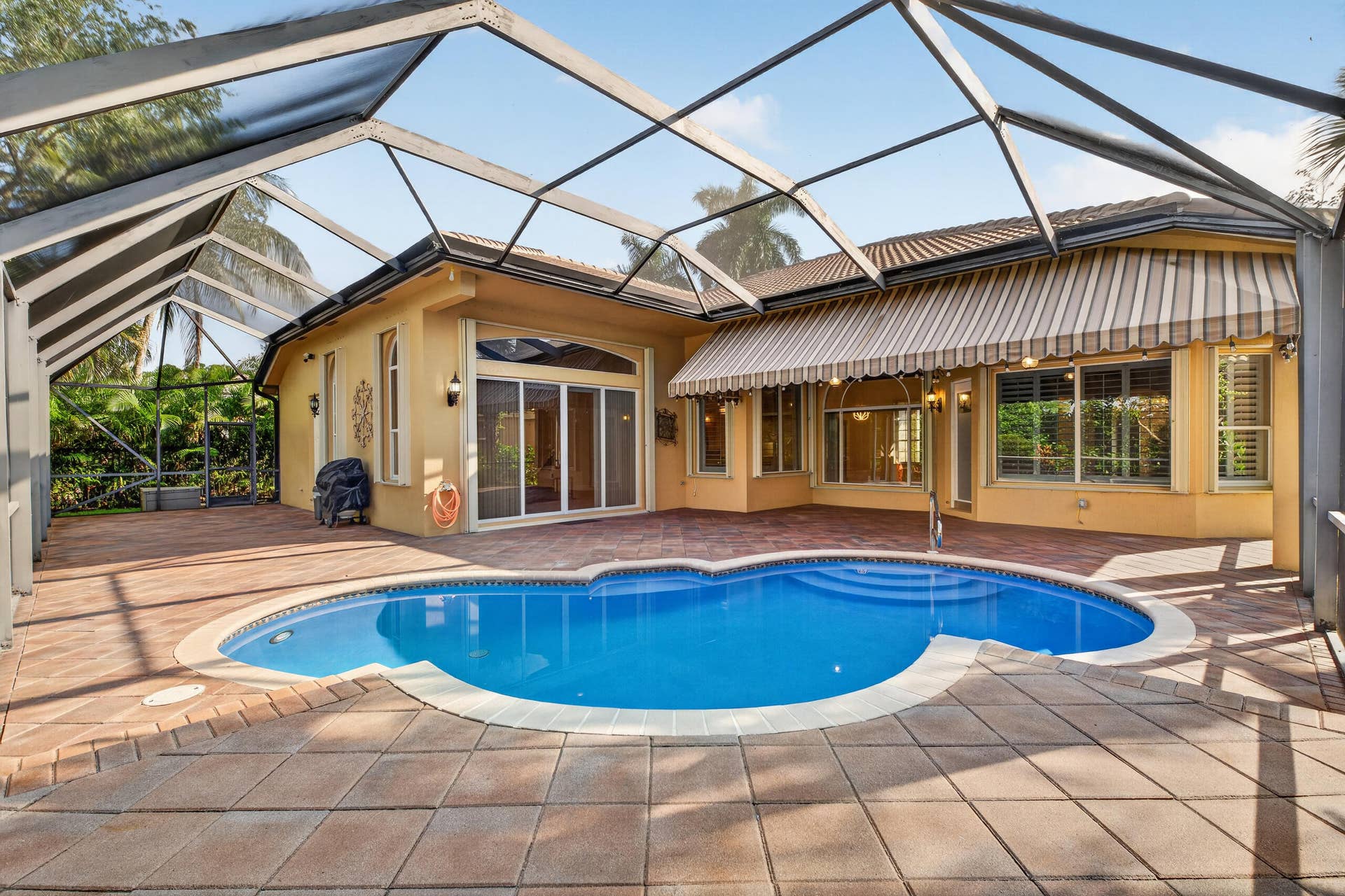 10625 Oak Meadow Lane, Lake Worth, FL 33449 Screened in over extended pool