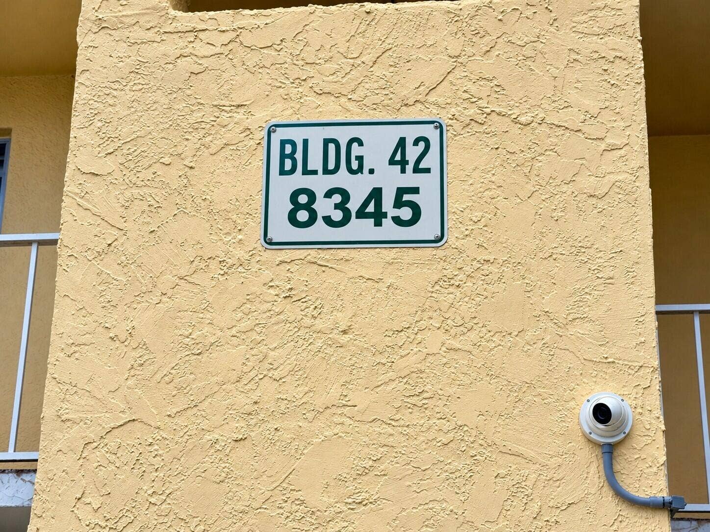 8345 SUNRISE LAKES Boulevard, #109, Sunrise, FL 33322 Building 42 Stucco Sign and Camera