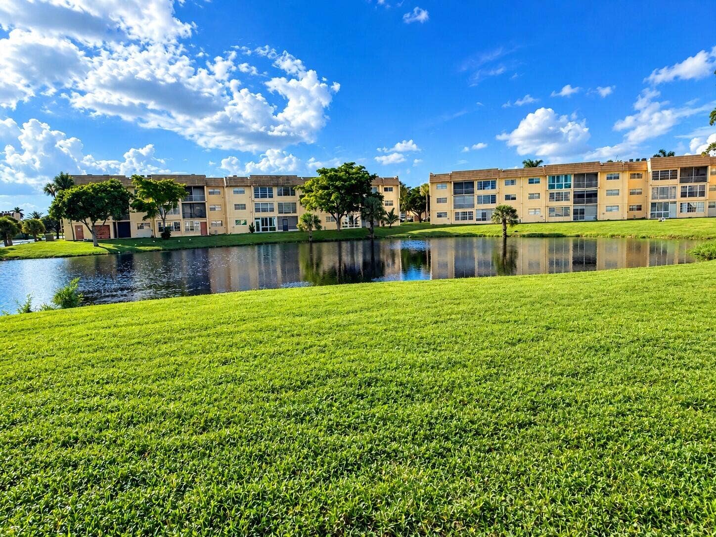 8345 SUNRISE LAKES Boulevard, #109, Sunrise, FL 33322 Backyard Pond and Apartments