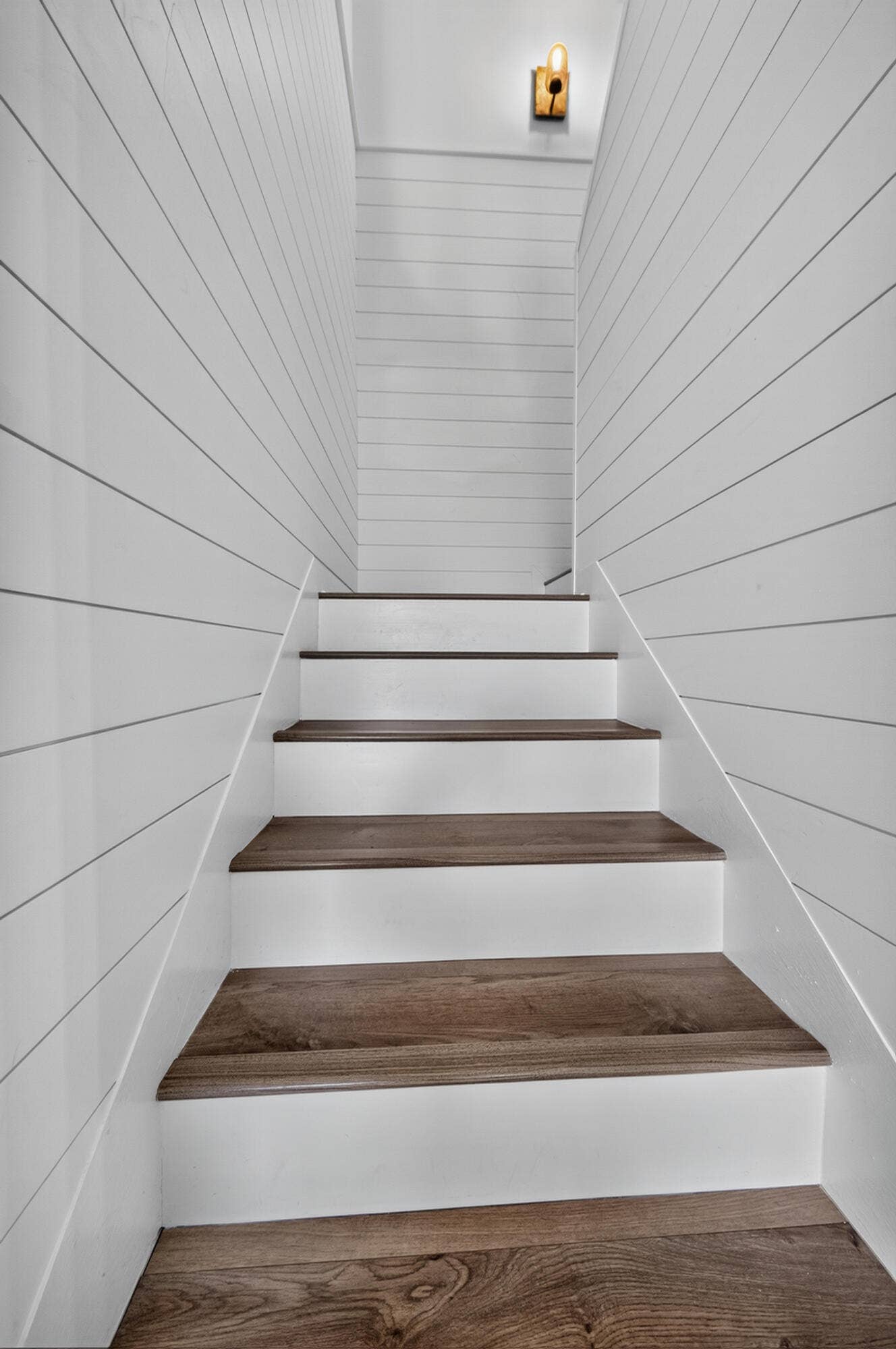 131 Yacht Club Way, #109, Hypoluxo, FL 33462 laminated flooring from stairs and second story throughout