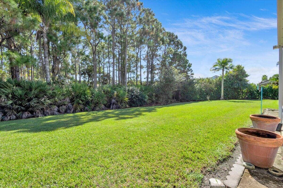 7119 SE Twin Oaks Circle, Stuart, FL 34997 Back Yard Preserve View