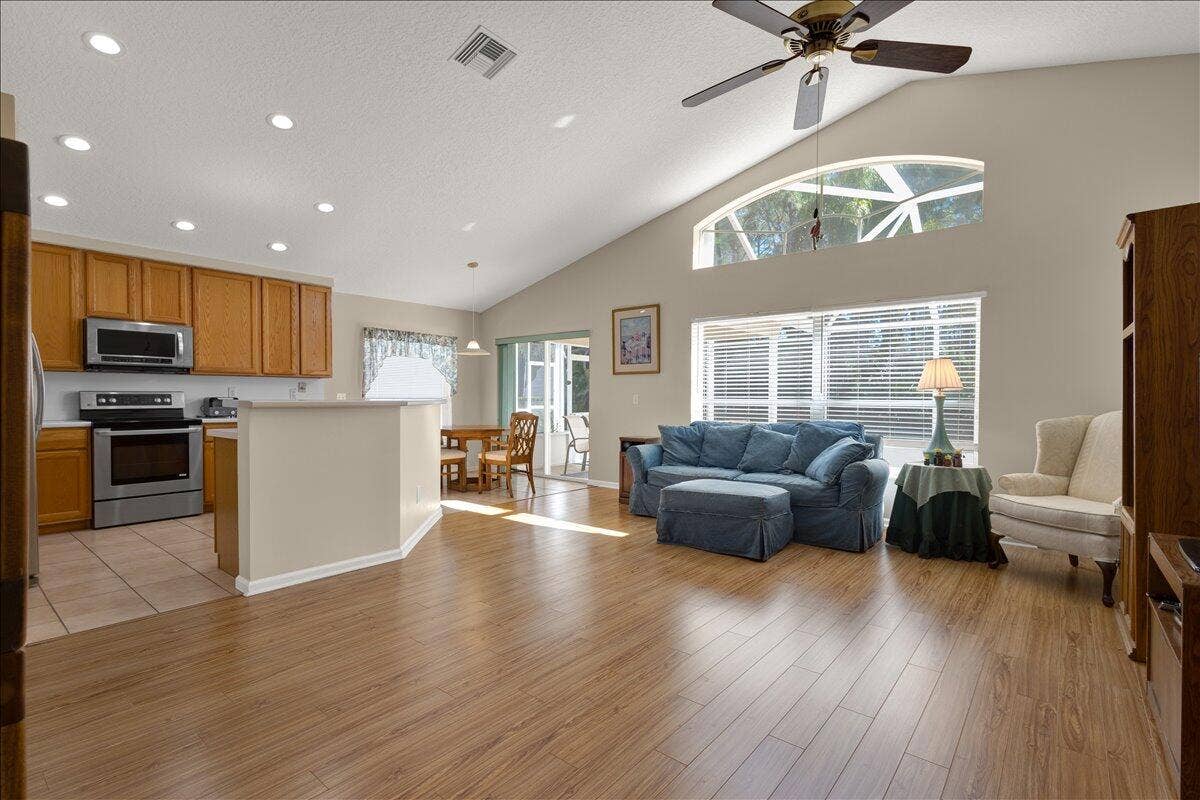 7119 SE Twin Oaks Circle, Stuart, FL 34997 Family Room-Kitchen open concept