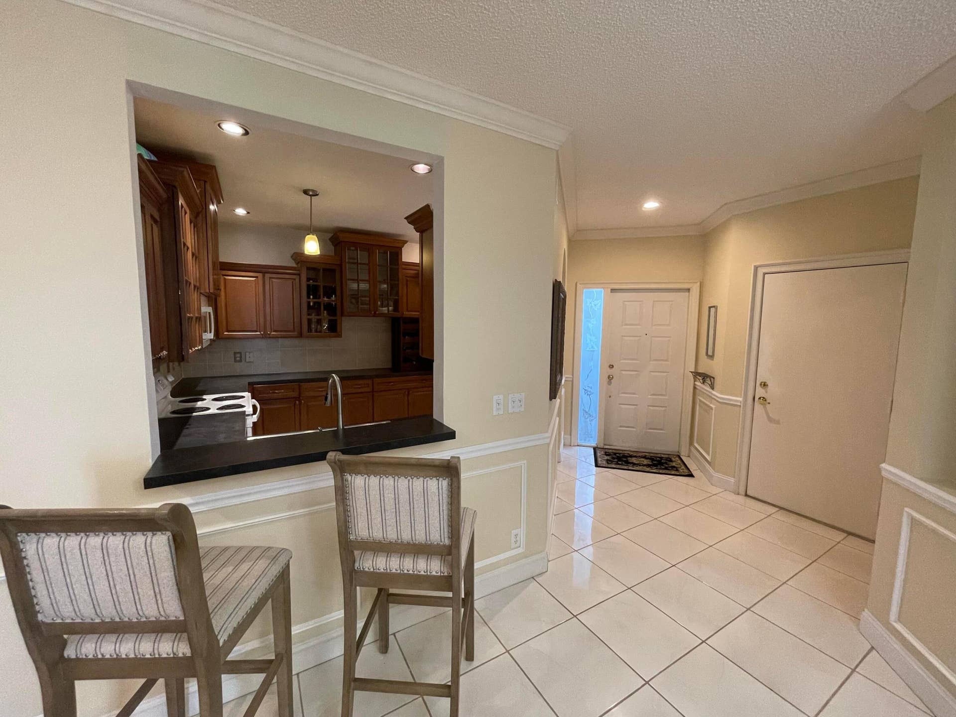 7911 Laina Lane, #1, Boynton Beach, FL 33437 Kitchen Passthrough and front door