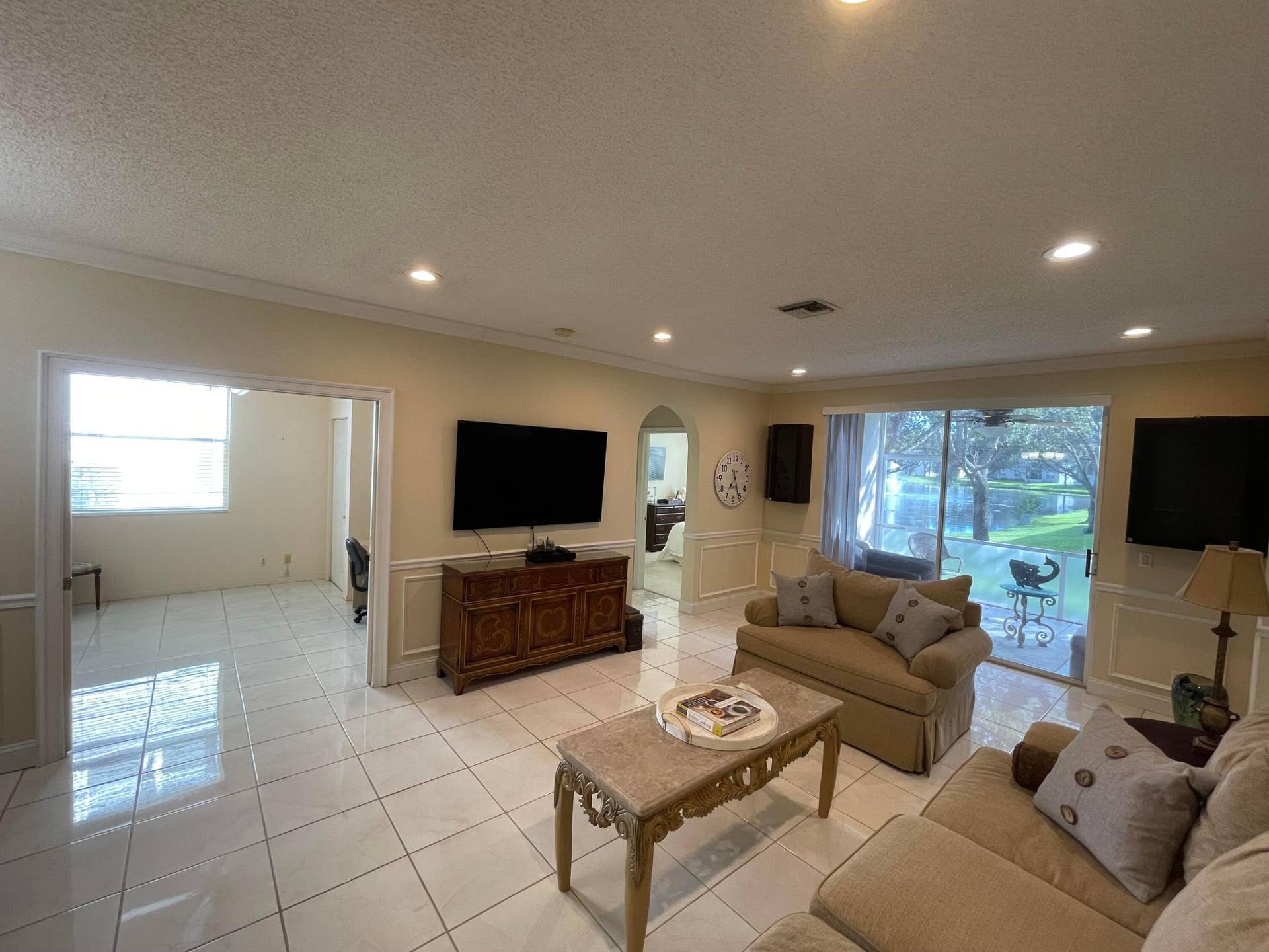 7911 Laina Lane, #1, Boynton Beach, FL 33437 Living Room Den Patio