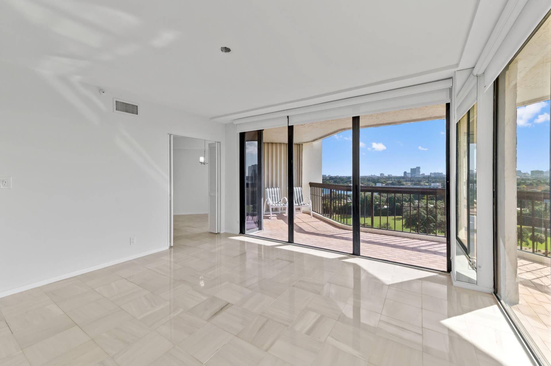 1900 CONSULATE Place, #1004, West Palm Beach, FL 33401 09 Living Room 06