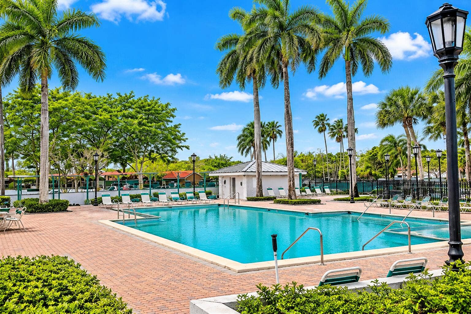 18286 MEDITERRANEAN Boulevard, #202, Hialeah, FL 33015 wide_bright_daytime_resort_style_pool_ar