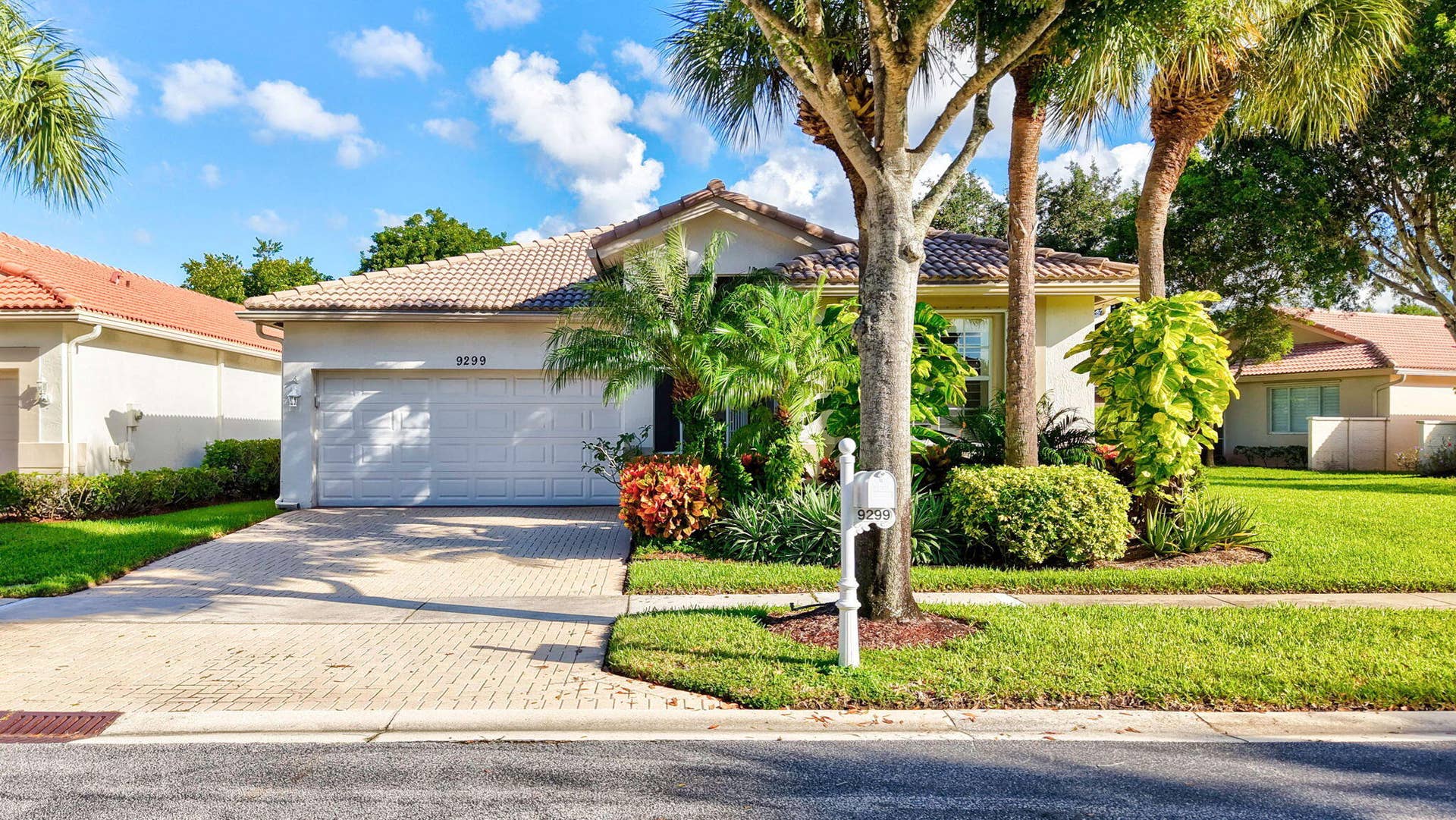 9299 Sapphire Cove Drive, West Palm Beach, FL 33411 Front Exterior