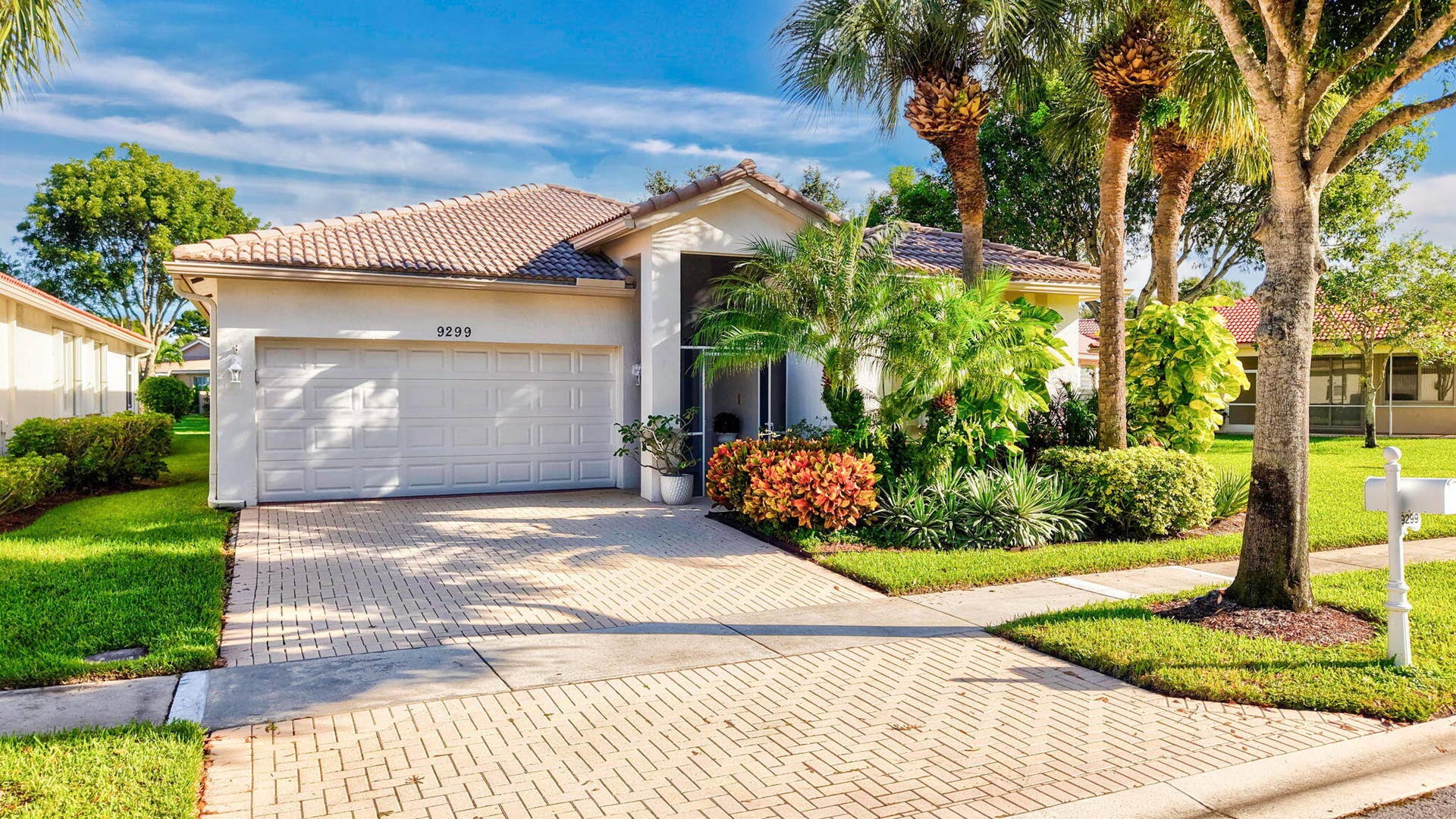9299 Sapphire Cove Drive, West Palm Beach, FL 33411 Front Exterior