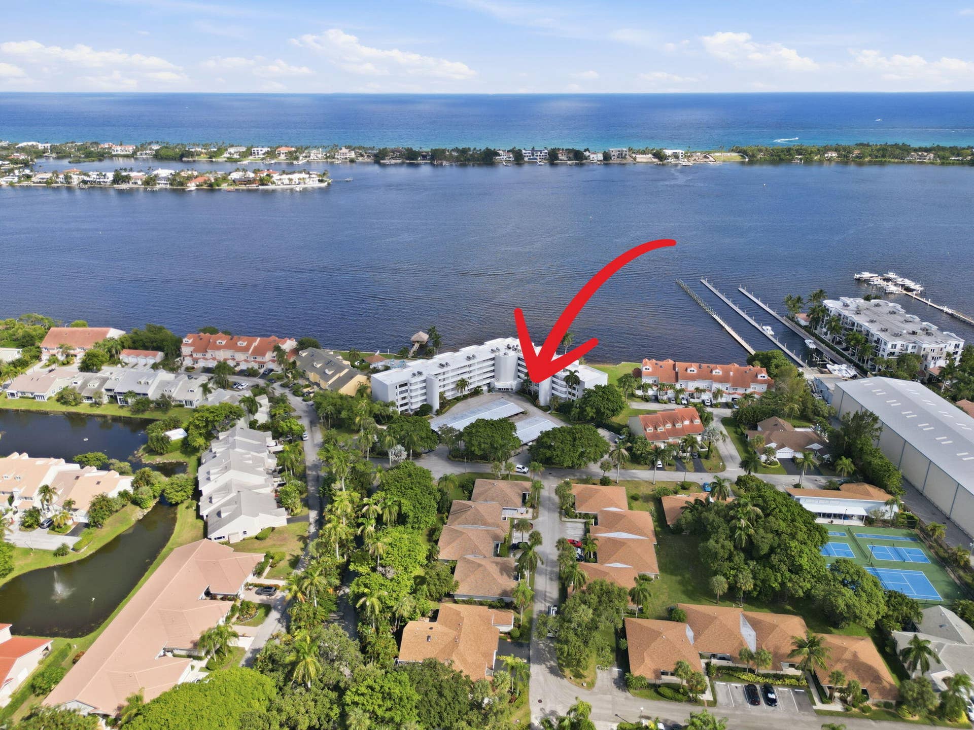 8200 Lakeshore Drive, #2020, Hypoluxo, FL 33462 droneof buildingarrowandfacingmanalapana