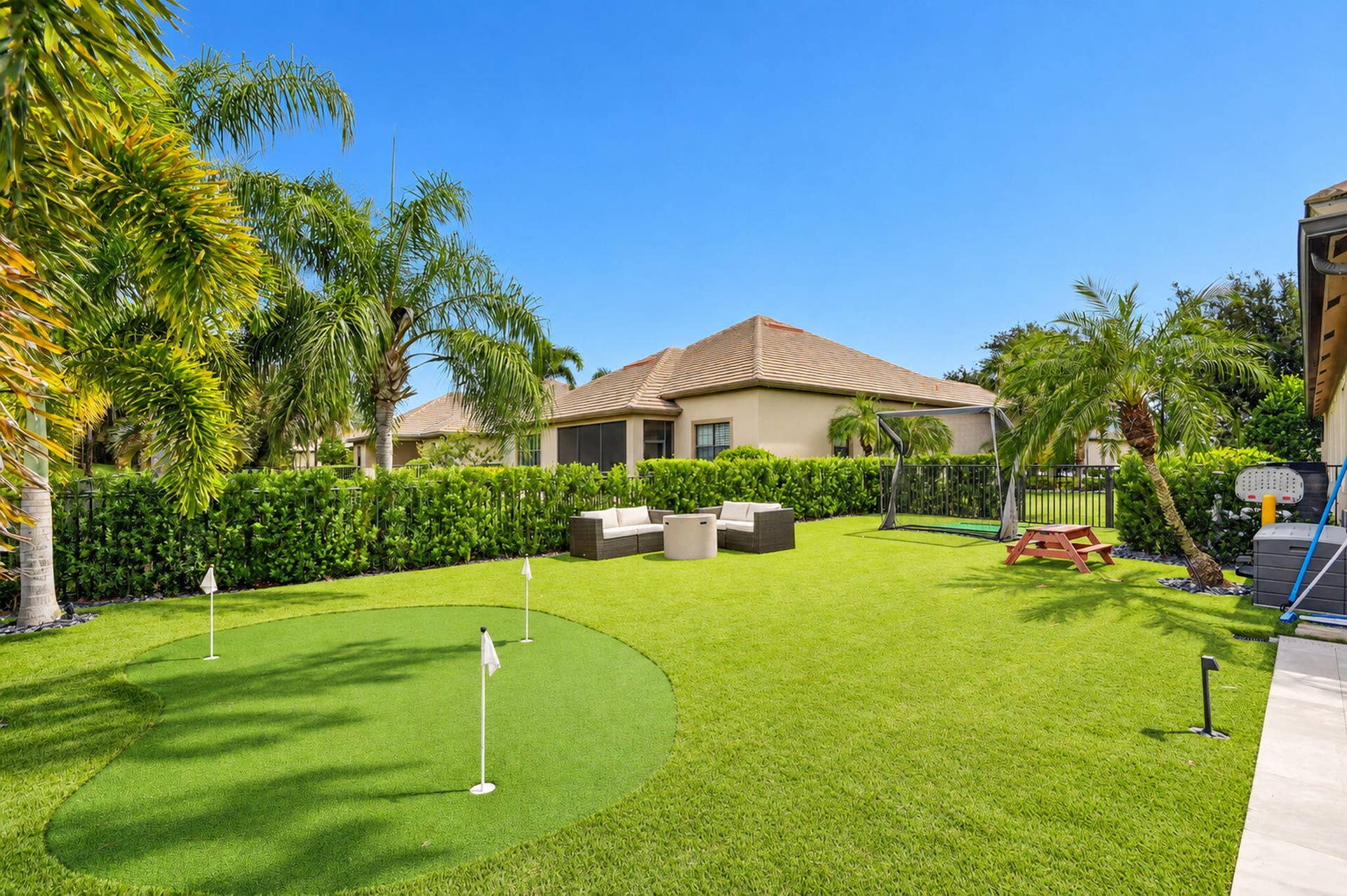 4637 Siena Circle, Wellington, Wellington, FL 33414 Turfed Putting Green/Fire Pit