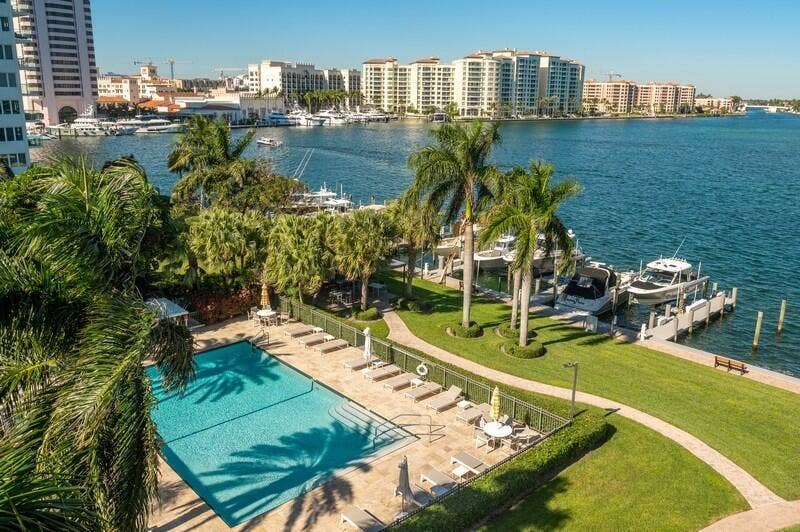 AERIAL OF POOL ON LAKE