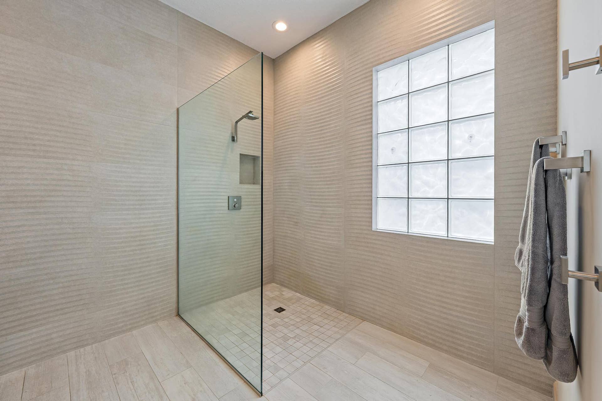 244 HONEYSUCKLE Drive, Jupiter, FL 33458 Shower redesigned and enlarged. Level floor entry no lip. Very convenient