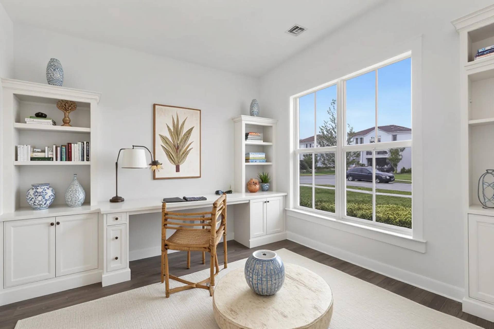 6742 SE LOST PINE Drive, Stuart, FL 34997 A versatile den or home office featuring beautiful natural light and pleasant outdoor views, creating a bright and inviting space.