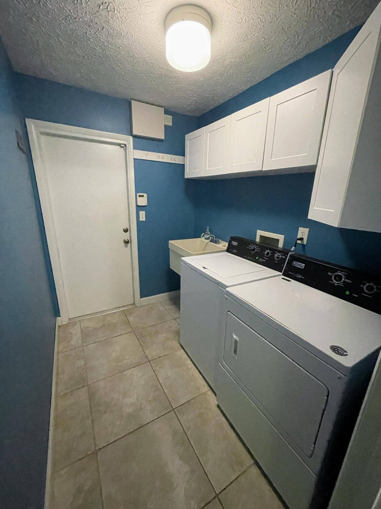 2616 Newport Drive, Fort Pierce, FL 34982 laundry, door to garage