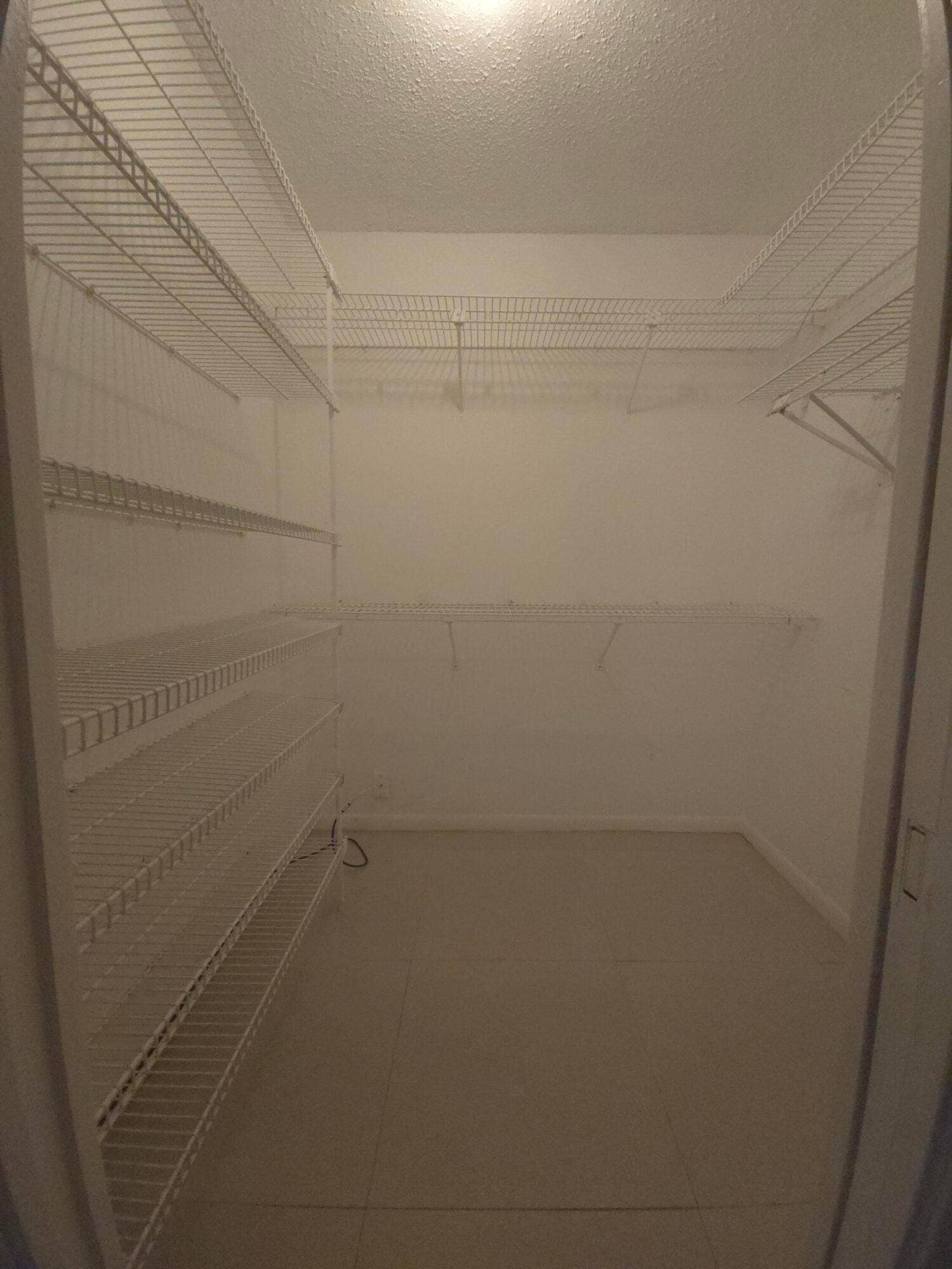 413 GREENBRIER A, West Palm Beach, FL 33417 Walk-in closet in primary bedroom