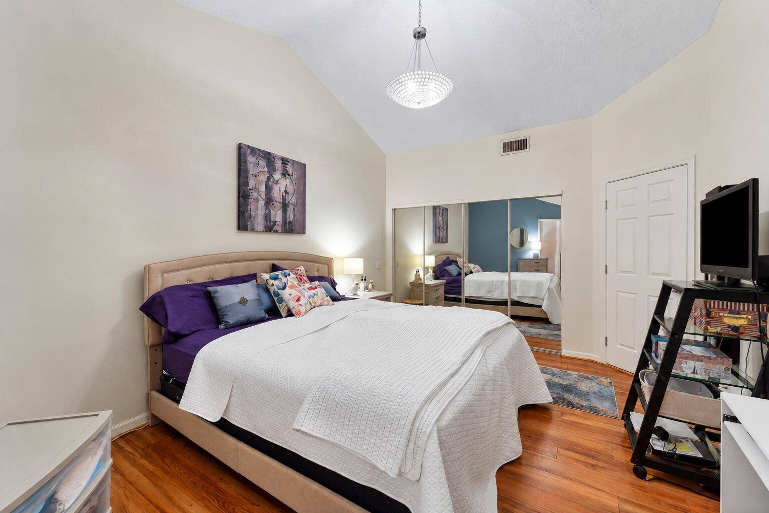 Bright Staged Bedroom with Mirrored Clos