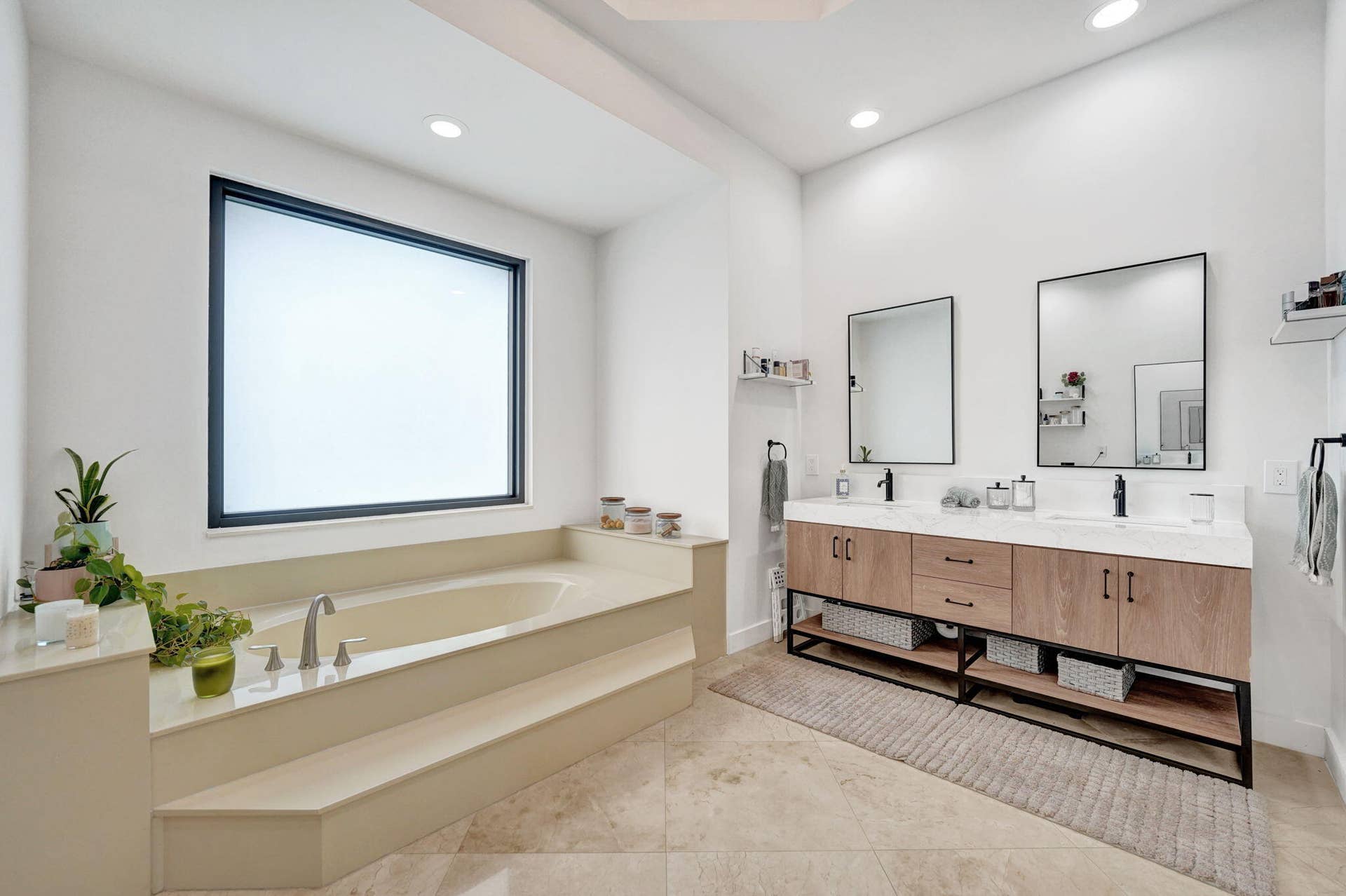 Primary bathroom with updated dual sinks vanities